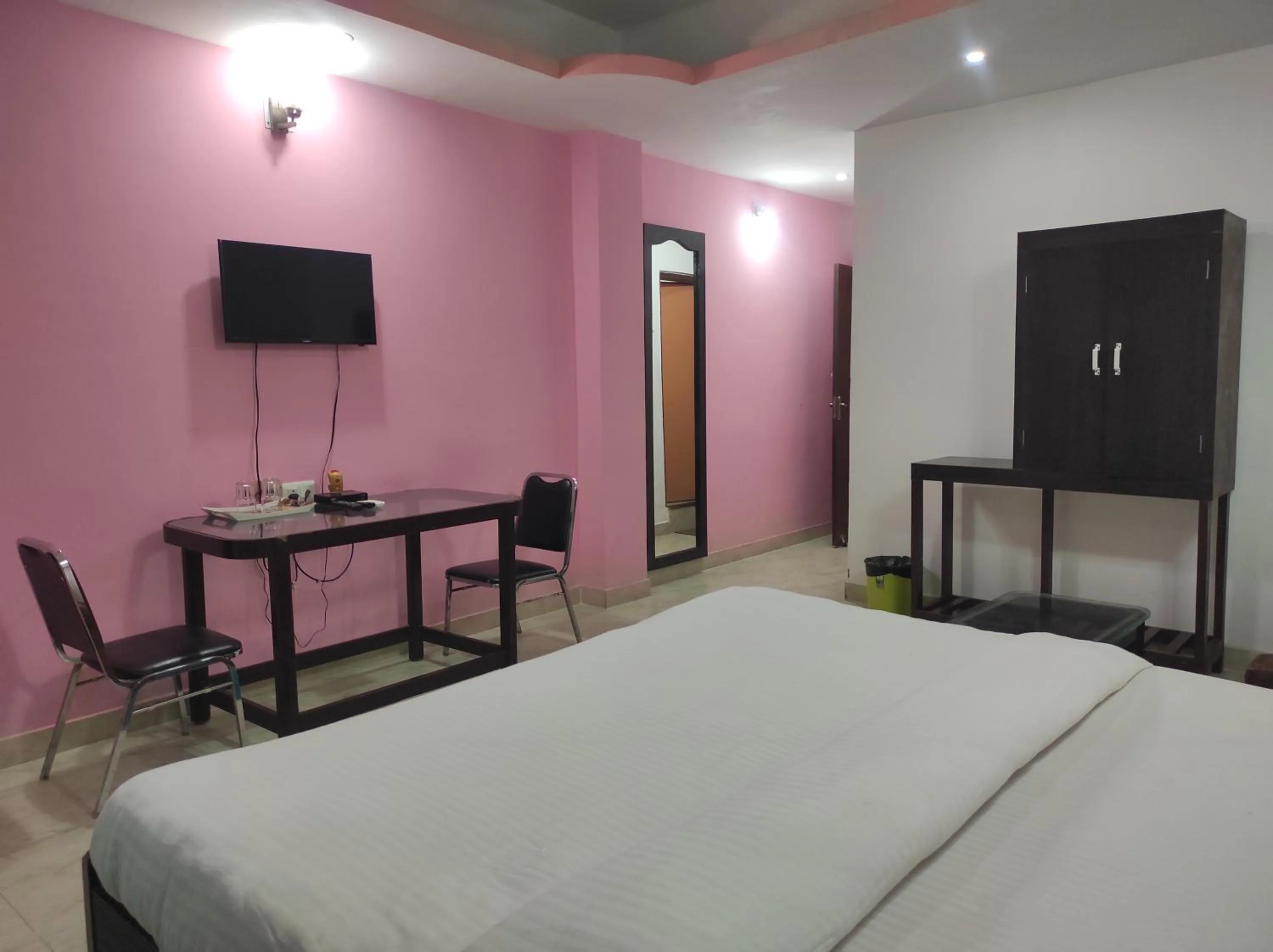 Bed in Hotel Sanjivani Heritage Top Best Budget Hotels in Dibrugarh, Assam