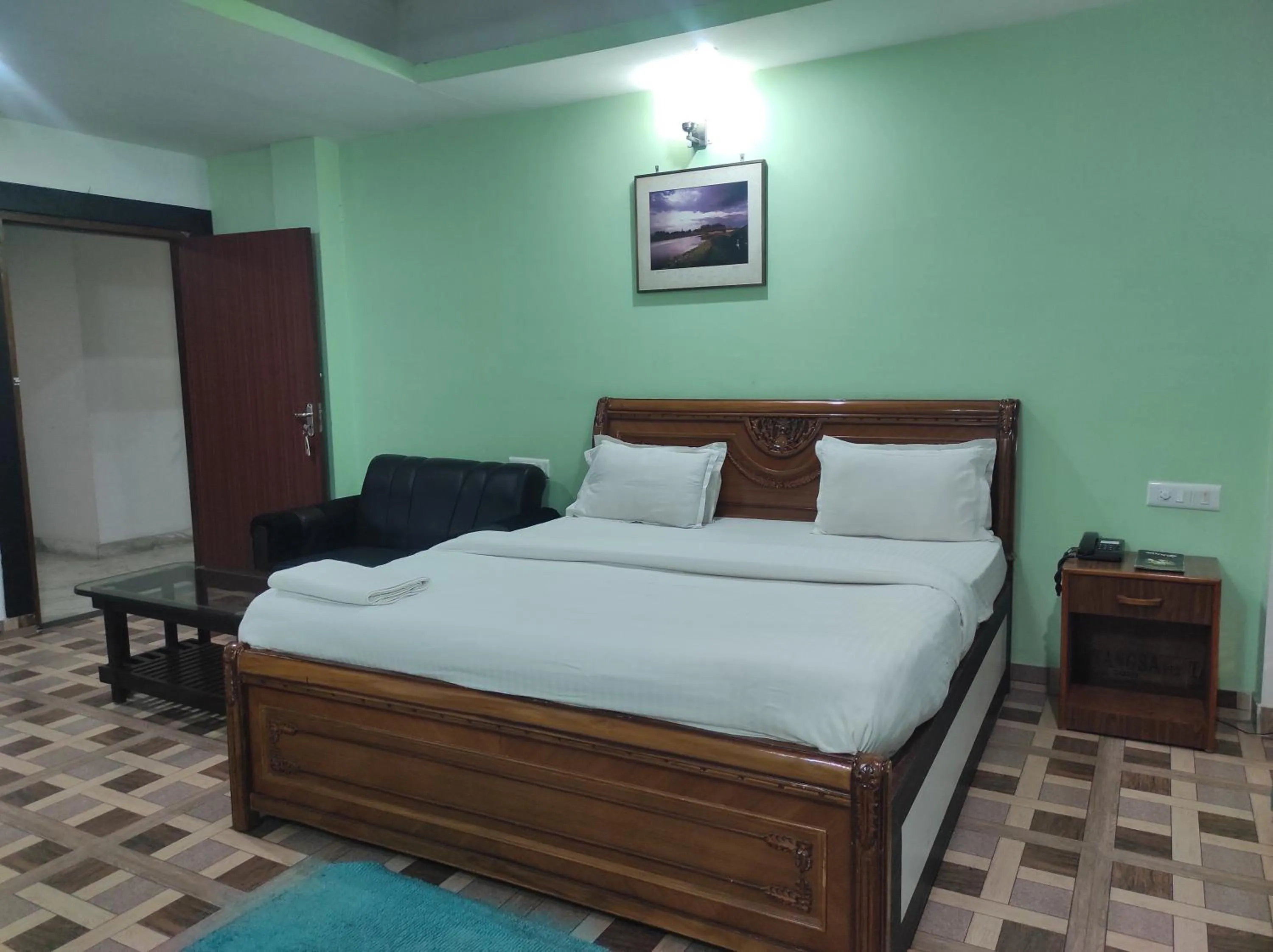 Bed in Hotel Sanjivani Heritage Top Best Budget Hotels in Dibrugarh, Assam