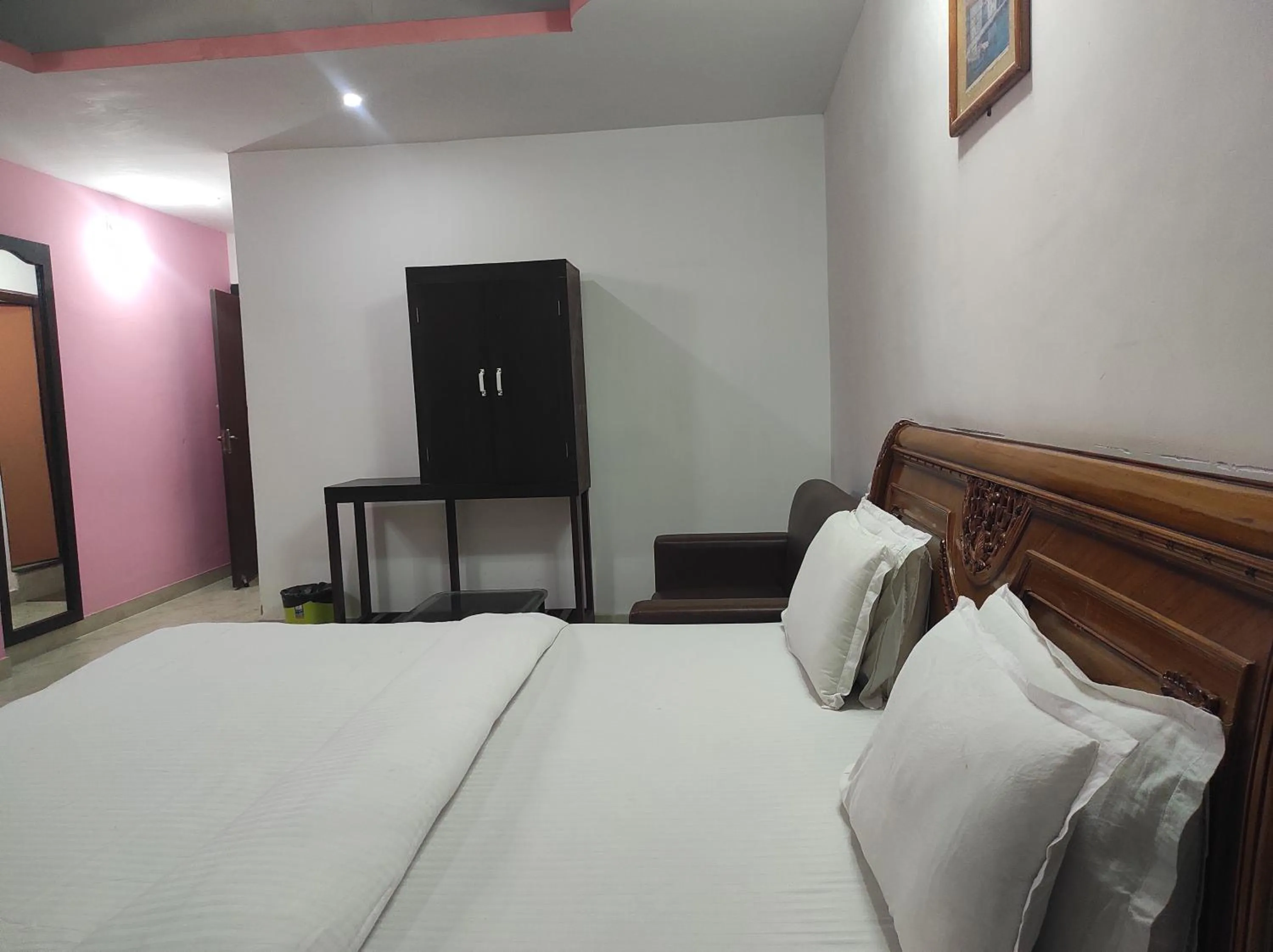 Bed in Hotel Sanjivani Heritage Top Best Budget Hotels in Dibrugarh, Assam