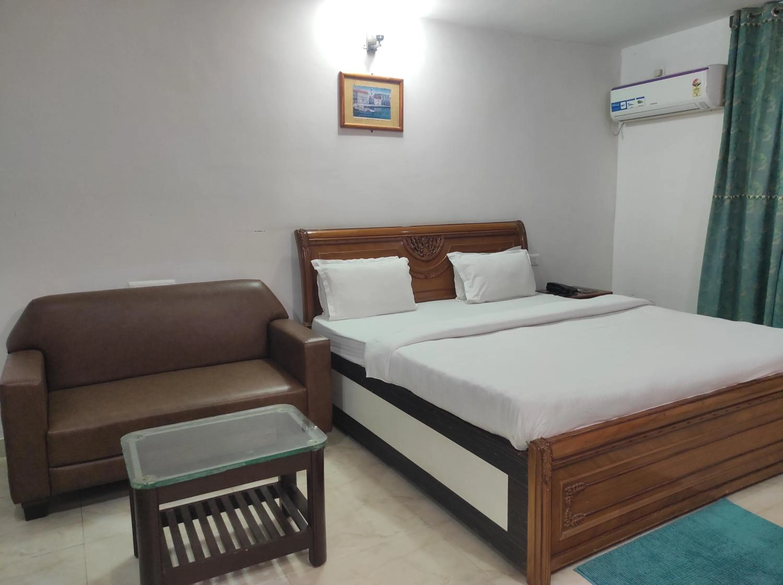 Bed in Hotel Sanjivani Heritage Top Best Budget Hotels in Dibrugarh, Assam