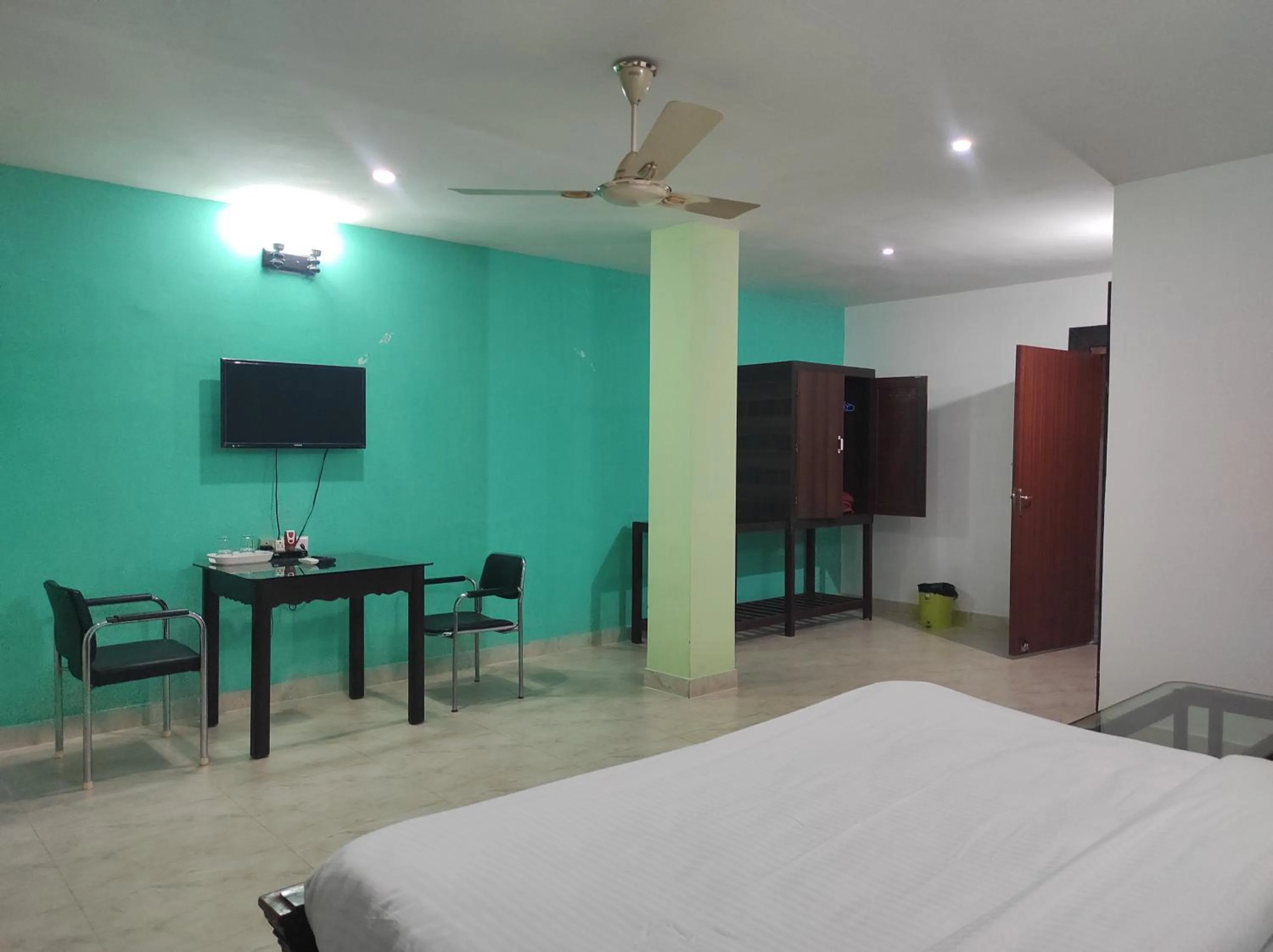 Bed in Hotel Sanjivani Heritage Top Best Budget Hotels in Dibrugarh, Assam