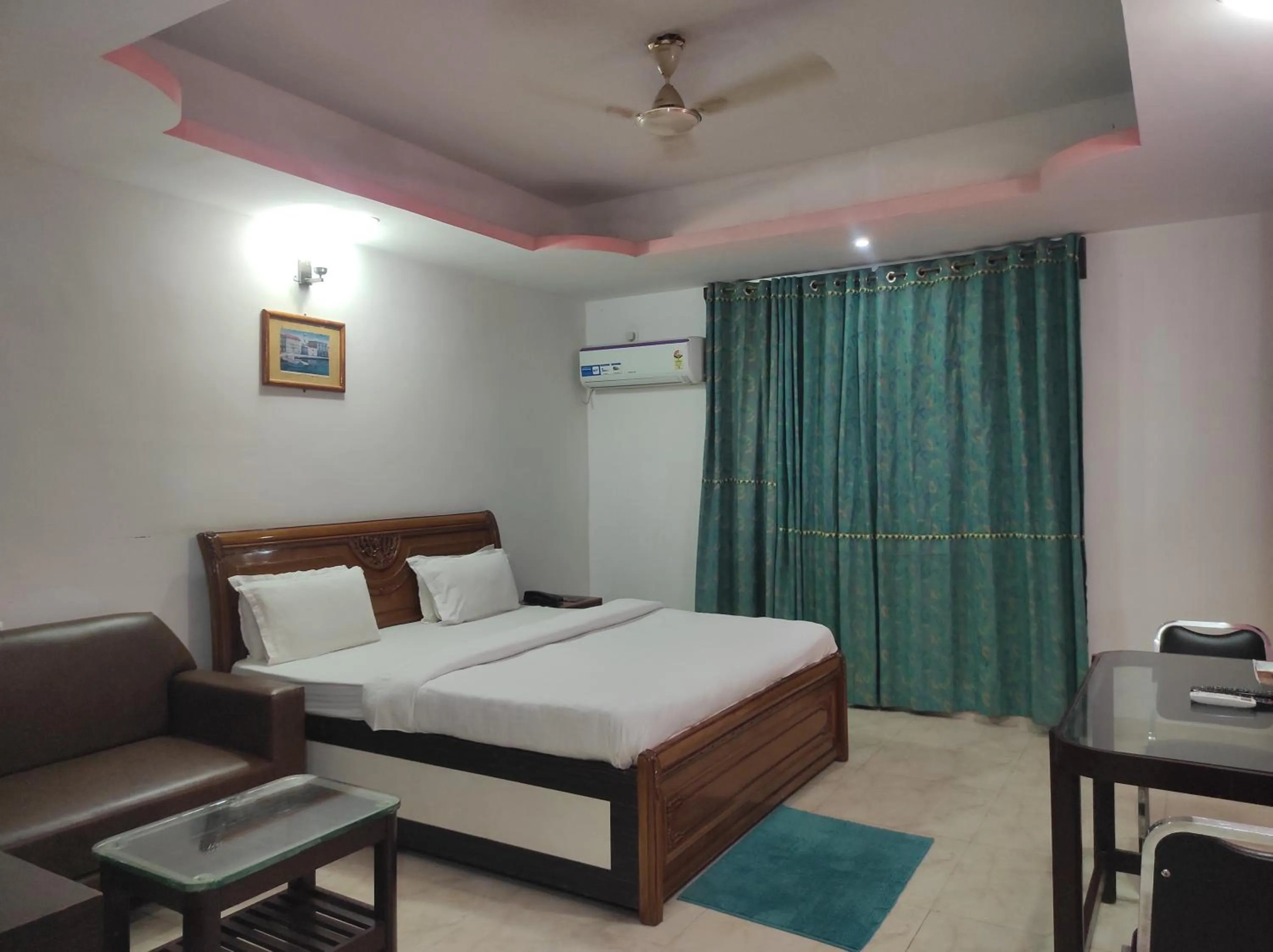 Bed in Hotel Sanjivani Heritage Top Best Budget Hotels in Dibrugarh, Assam