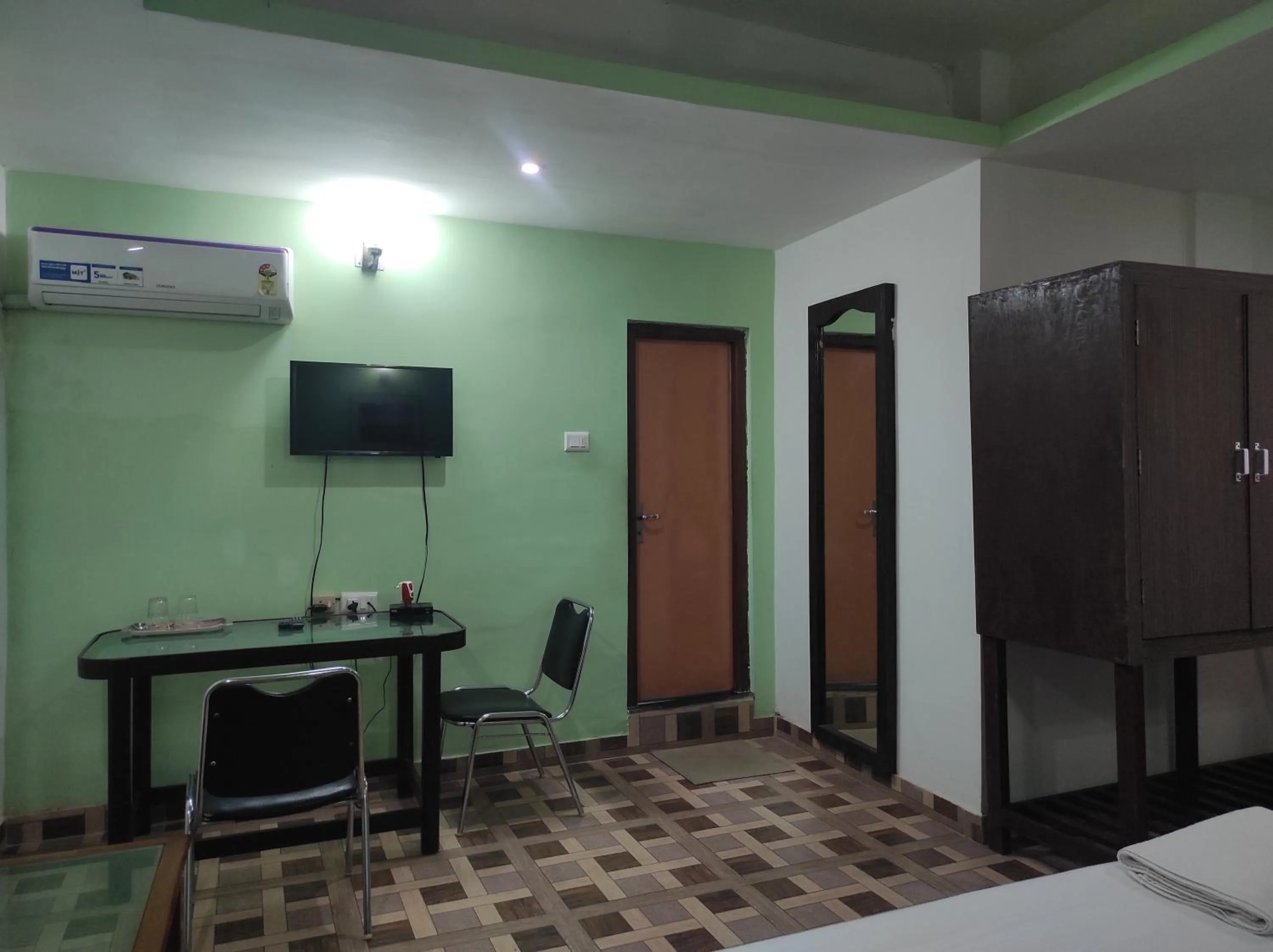 Bed in Hotel Sanjivani Heritage Top Best Budget Hotels in Dibrugarh, Assam