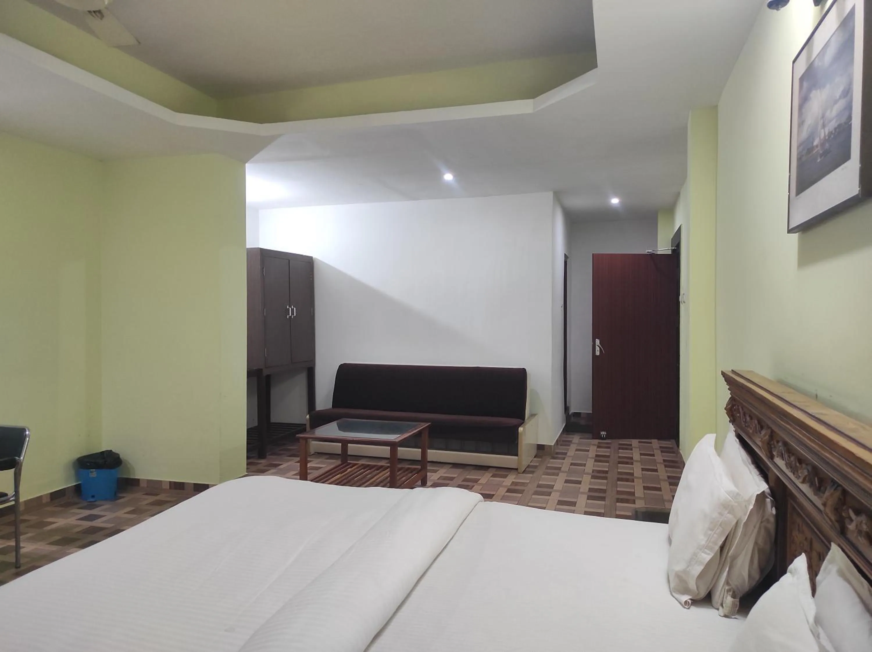 Bed in Hotel Sanjivani Heritage Top Best Budget Hotels in Dibrugarh, Assam