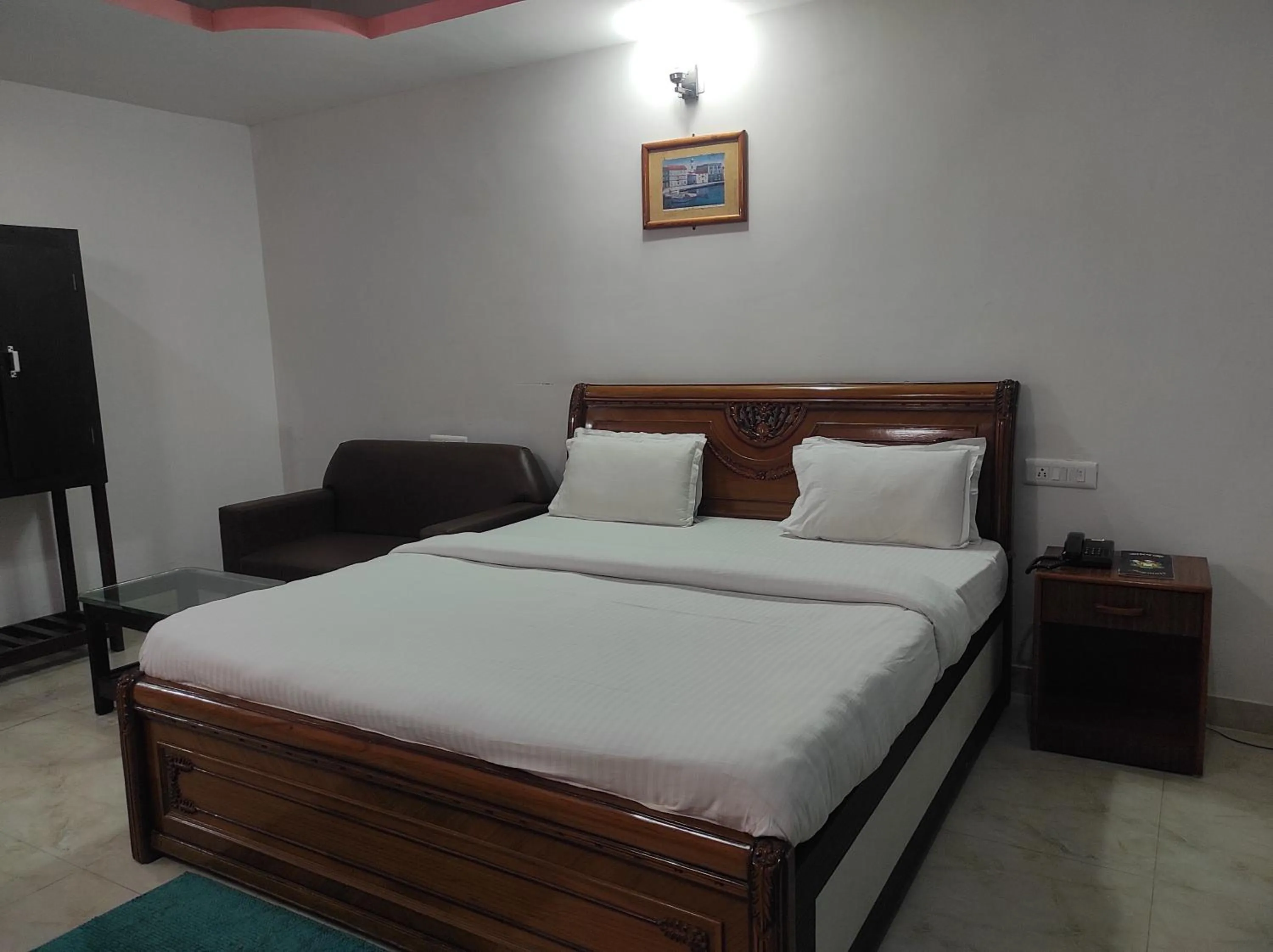 Bed in Hotel Sanjivani Heritage Top Best Budget Hotels in Dibrugarh, Assam