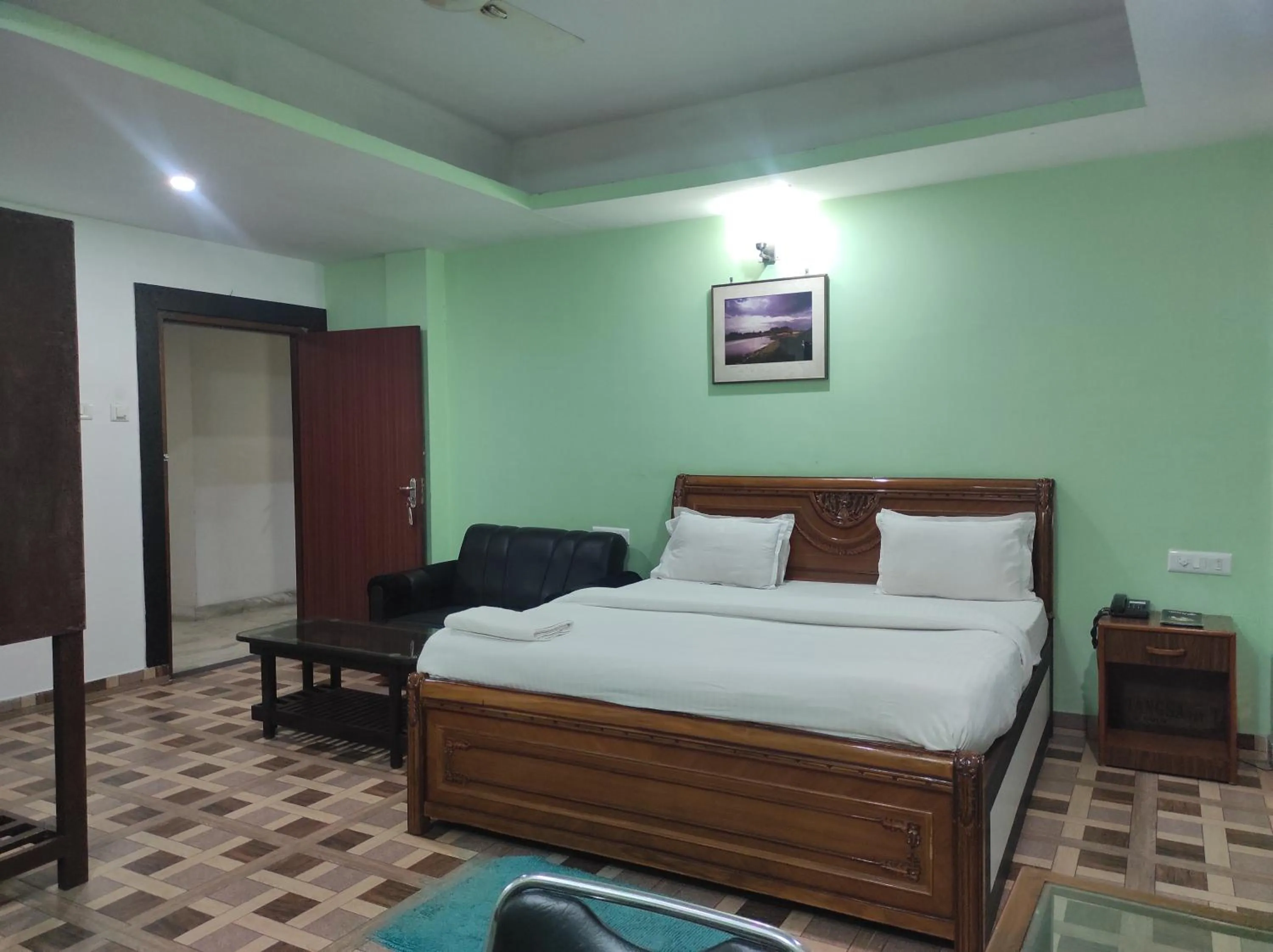 Bed in Hotel Sanjivani Heritage Top Best Budget Hotels in Dibrugarh, Assam