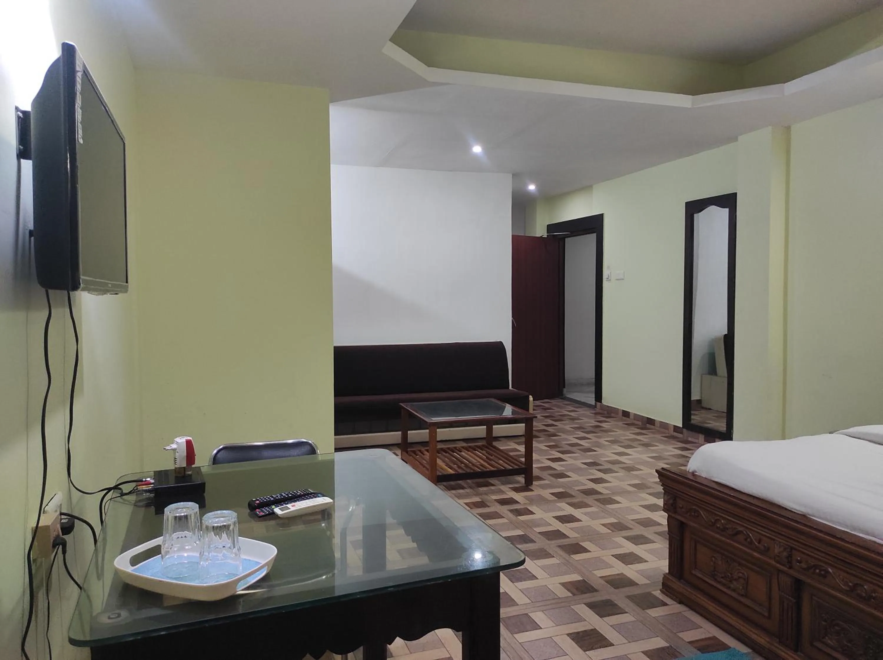 Bed in Hotel Sanjivani Heritage Top Best Budget Hotels in Dibrugarh, Assam