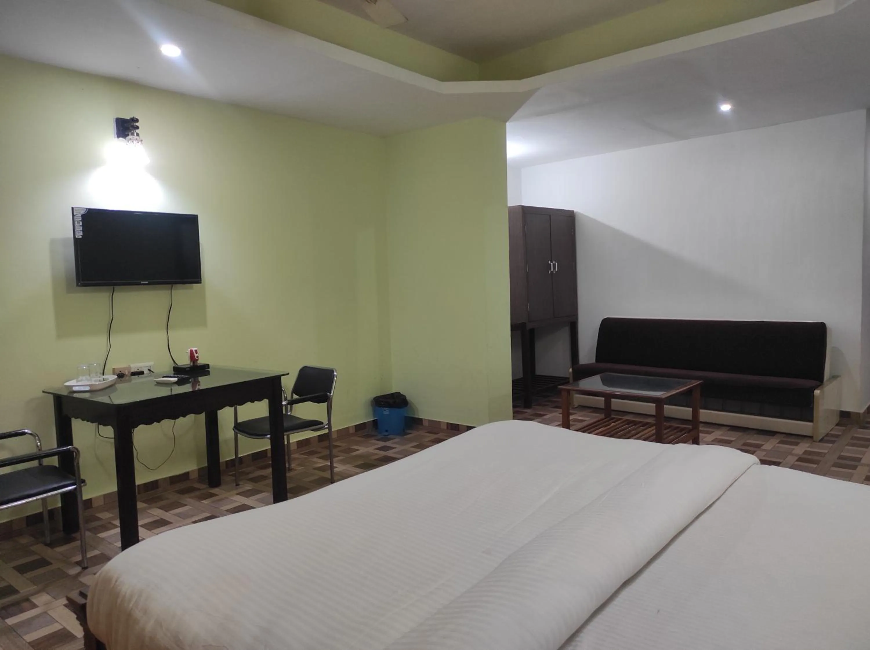 Bed in Hotel Sanjivani Heritage Top Best Budget Hotels in Dibrugarh, Assam