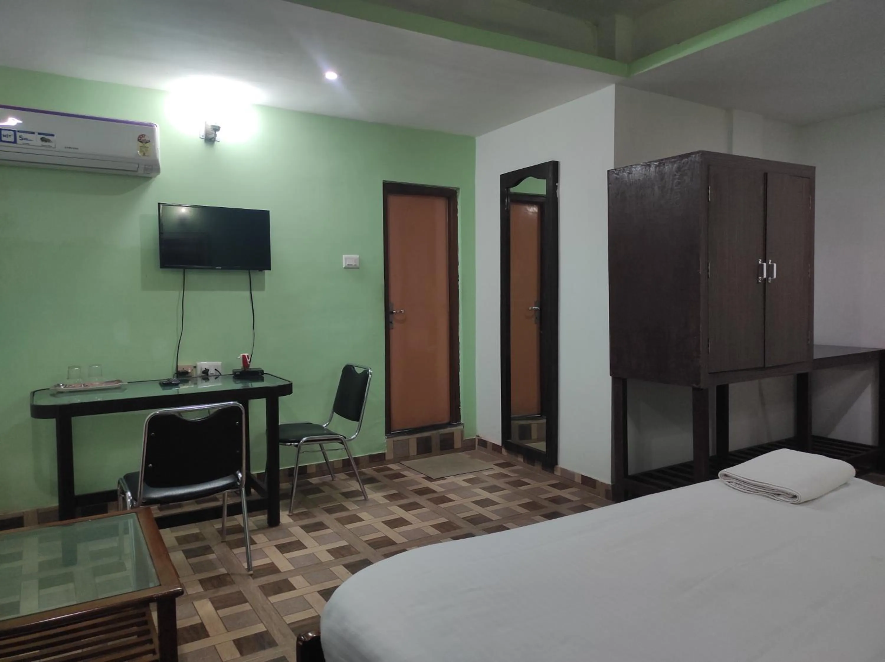 Bed in Hotel Sanjivani Heritage Top Best Budget Hotels in Dibrugarh, Assam