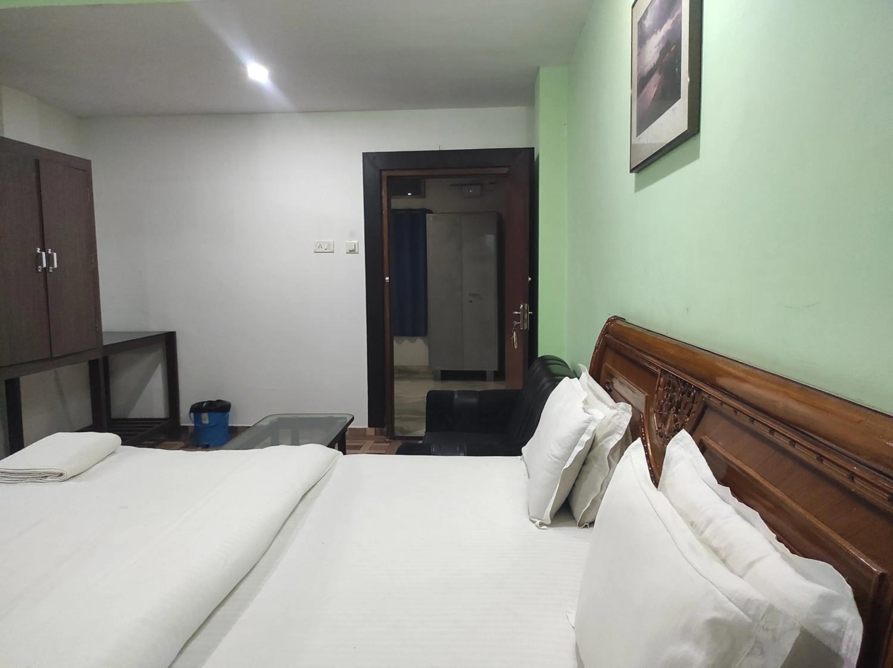 Bed in Hotel Sanjivani Heritage Top Best Budget Hotels in Dibrugarh, Assam