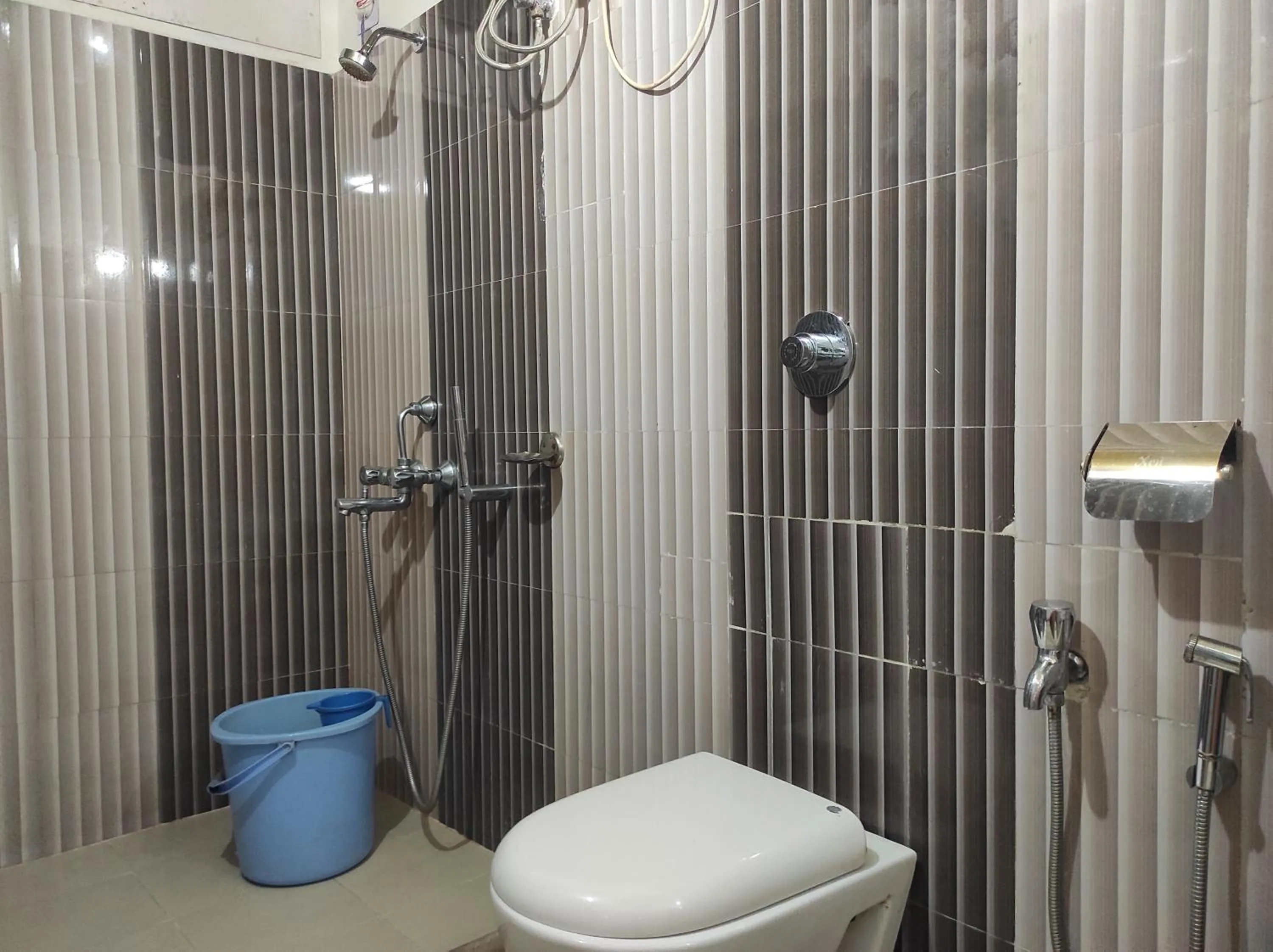 Shower in Hotel Sanjivani Heritage Top Best Budget Hotels in Dibrugarh, Assam