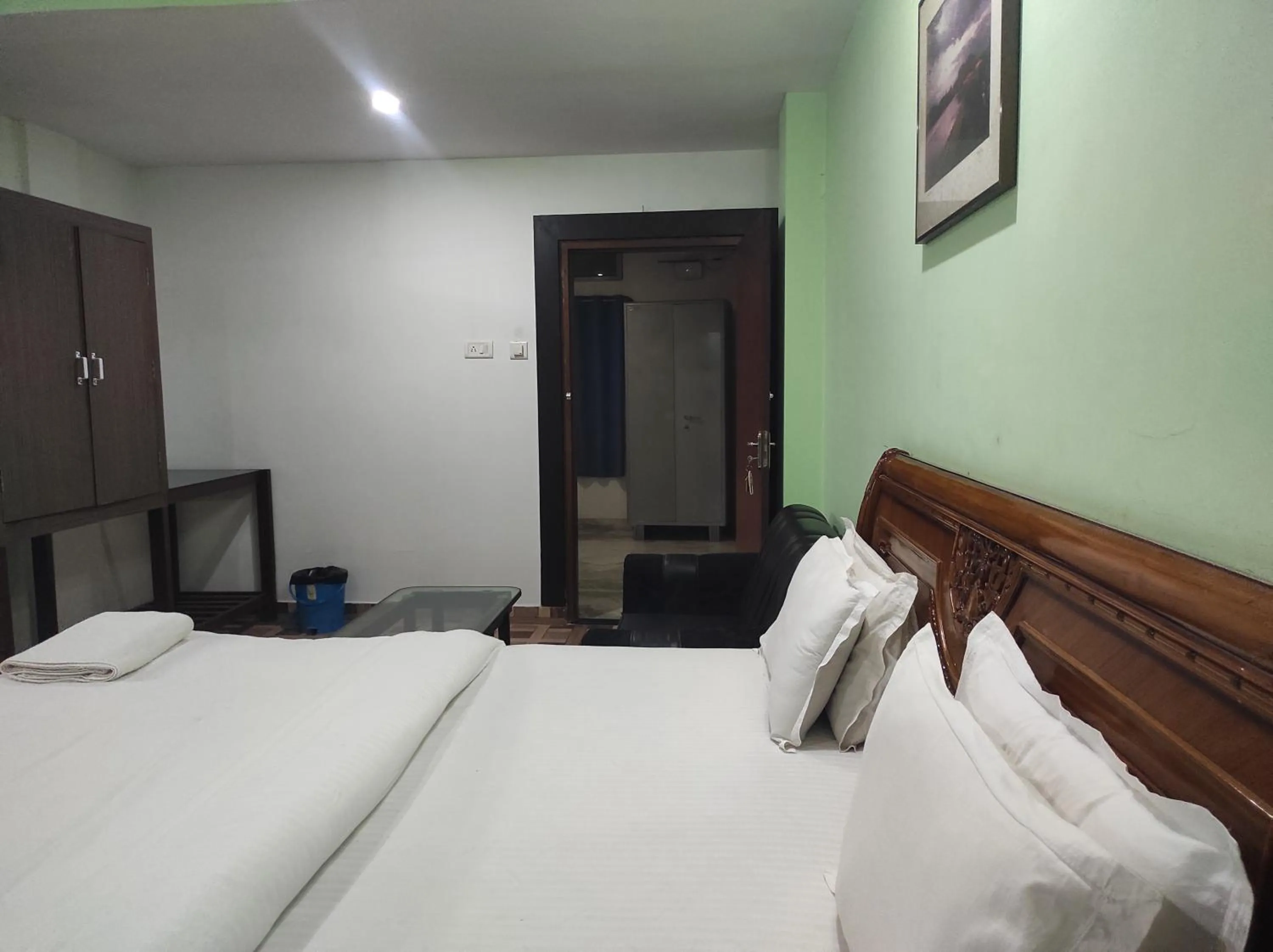 Bed in Hotel Sanjivani Heritage Top Best Budget Hotels in Dibrugarh, Assam