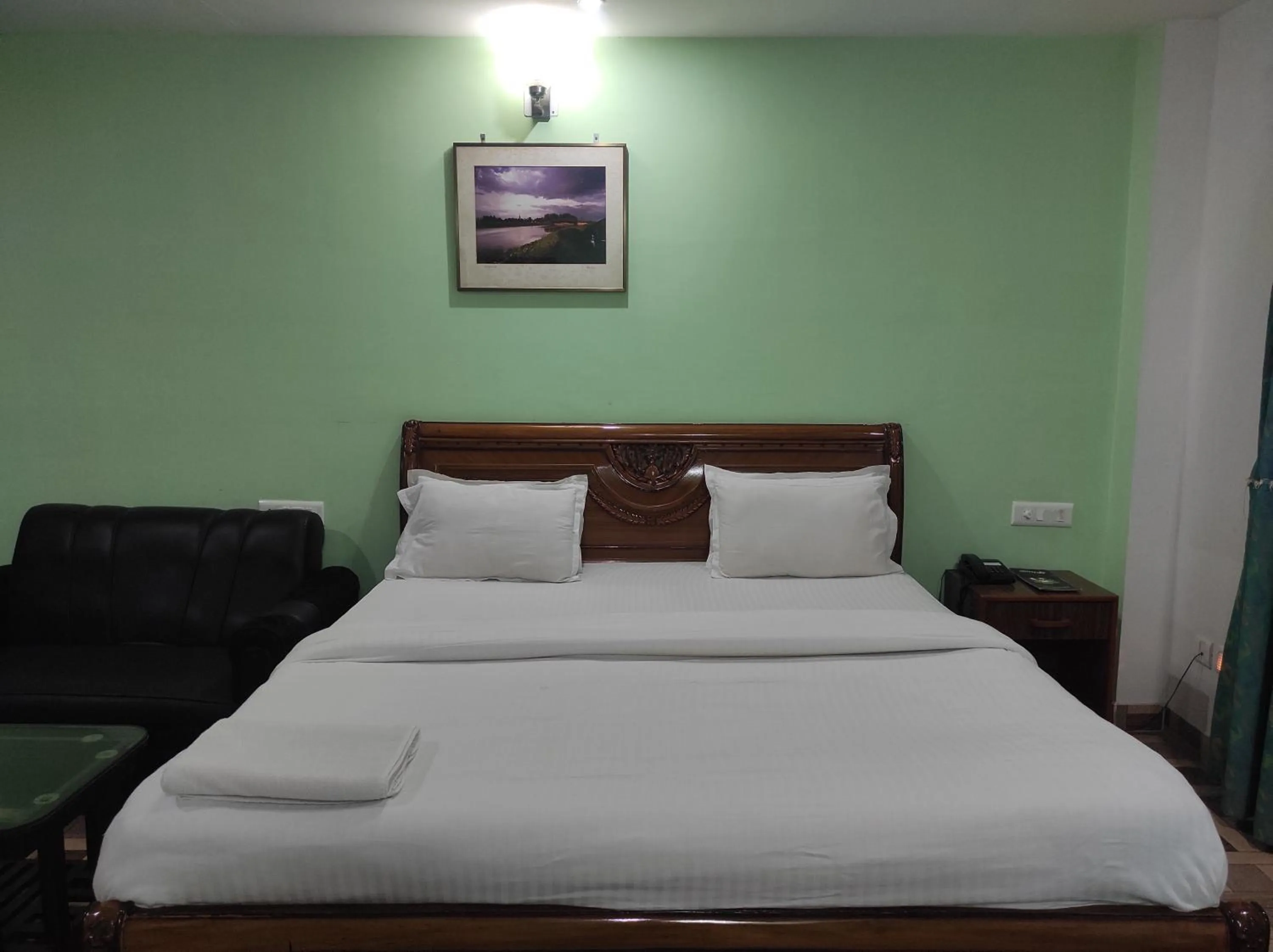 Bed in Hotel Sanjivani Heritage Top Best Budget Hotels in Dibrugarh, Assam