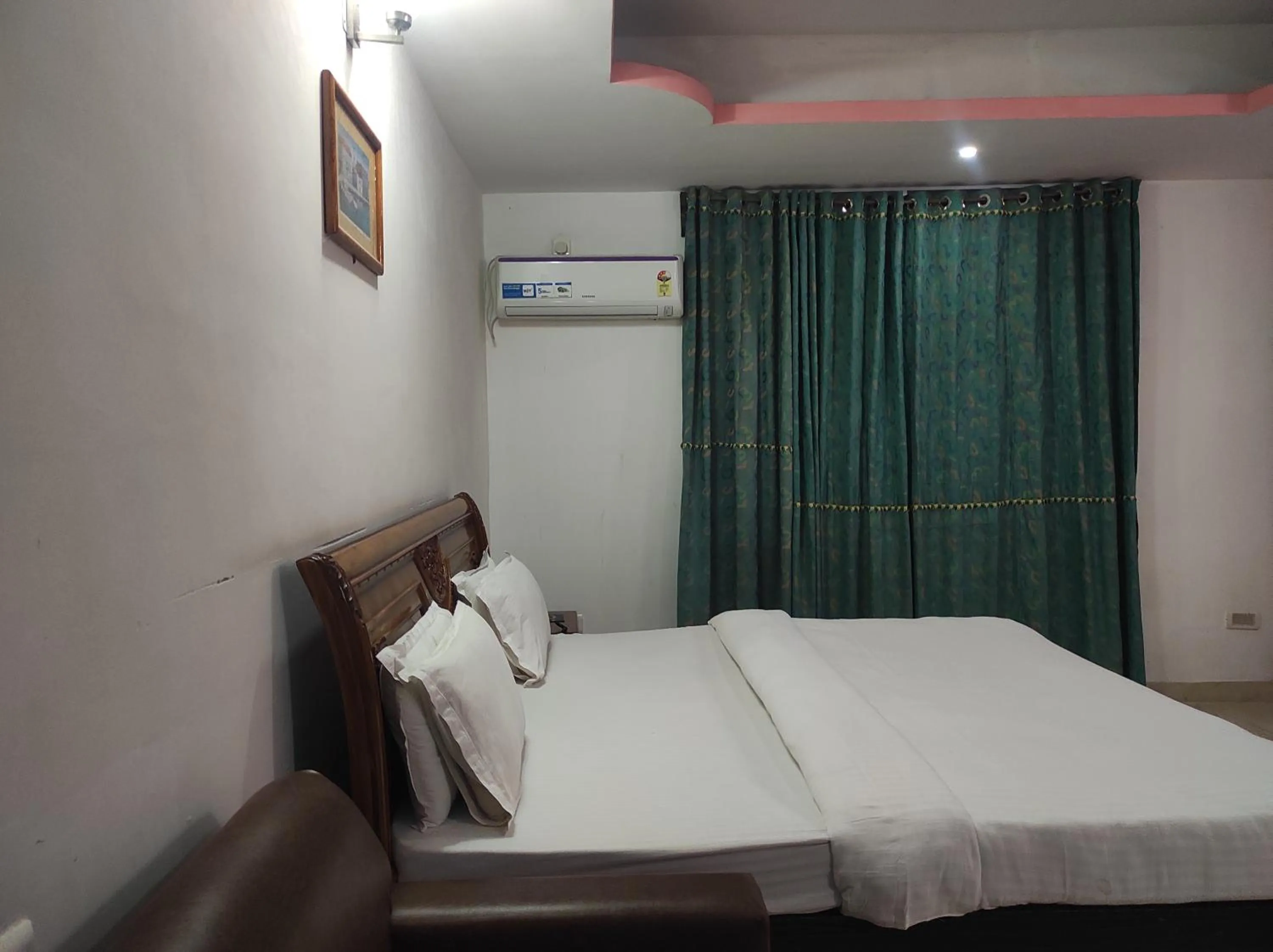 Bed in Hotel Sanjivani Heritage Top Best Budget Hotels in Dibrugarh, Assam