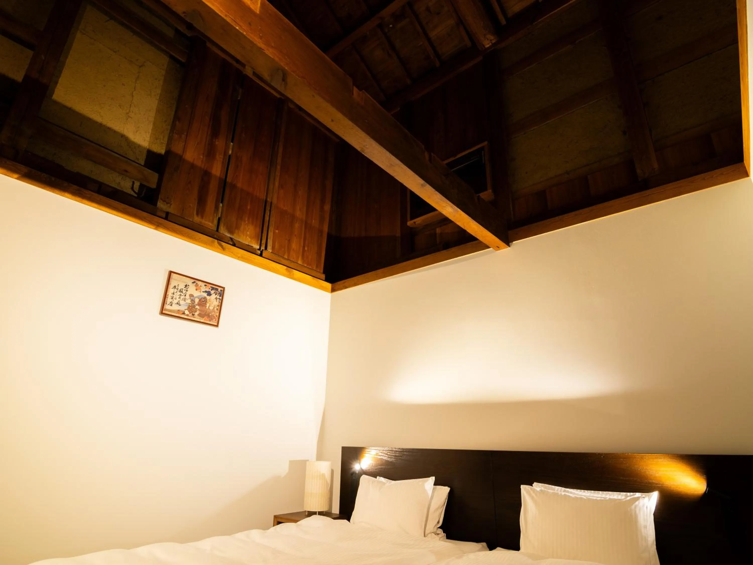 Bed in Auberge Homachi Mikuniminato