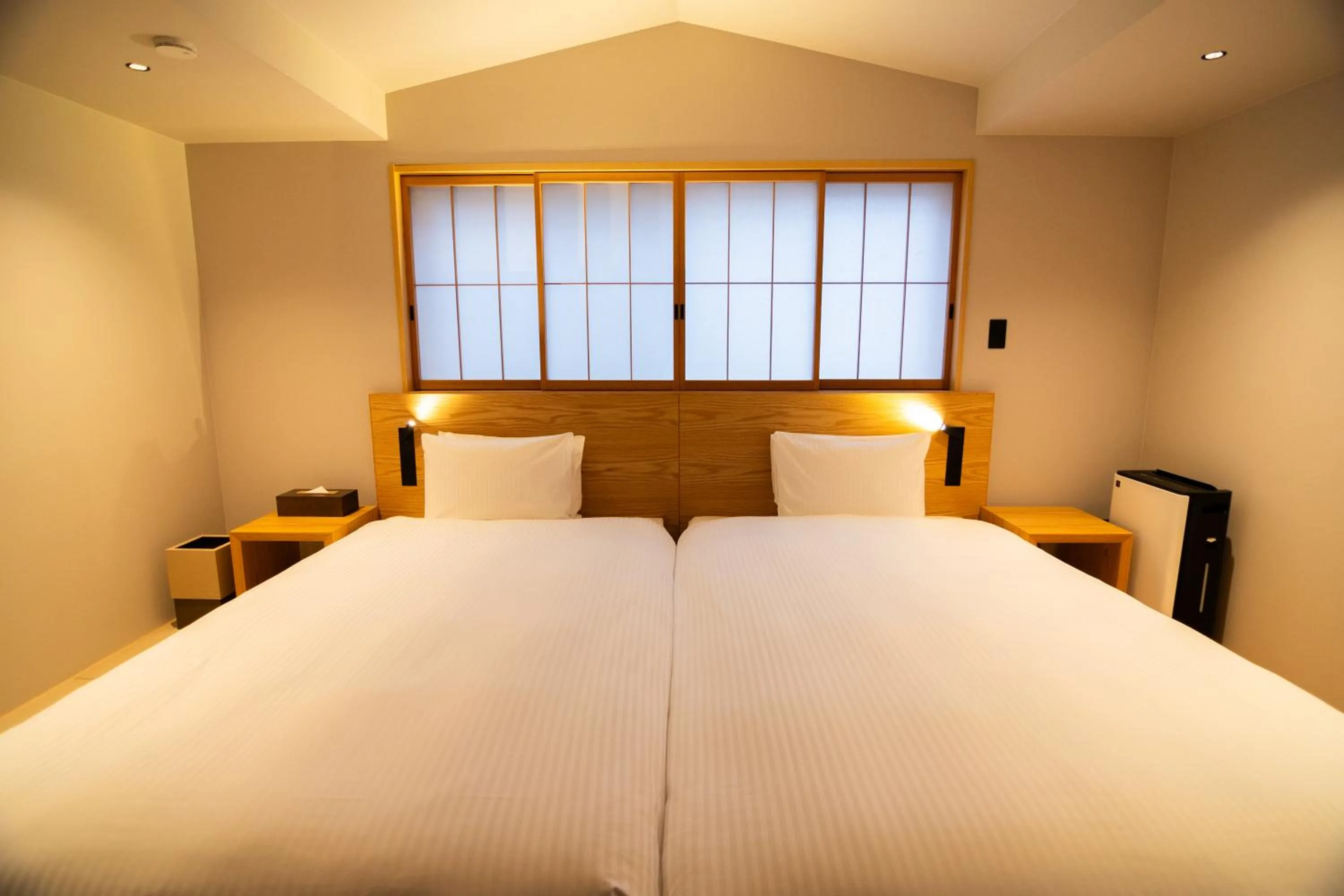 Bed in Auberge Homachi Mikuniminato