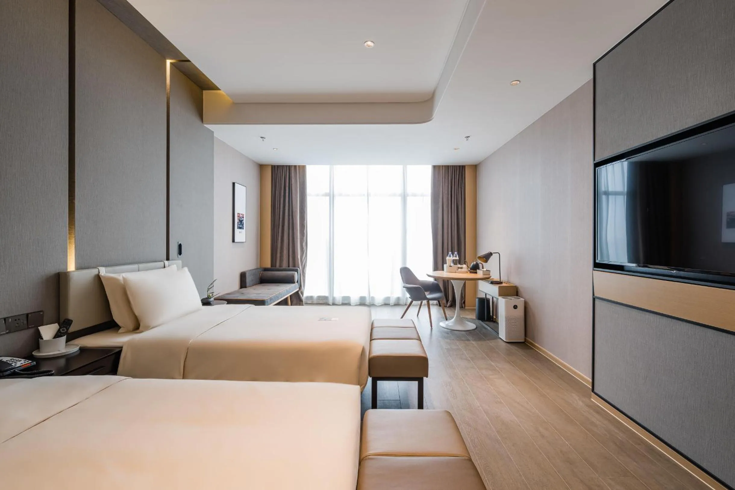 Bed in Atour Hotel Wuxi Coast City