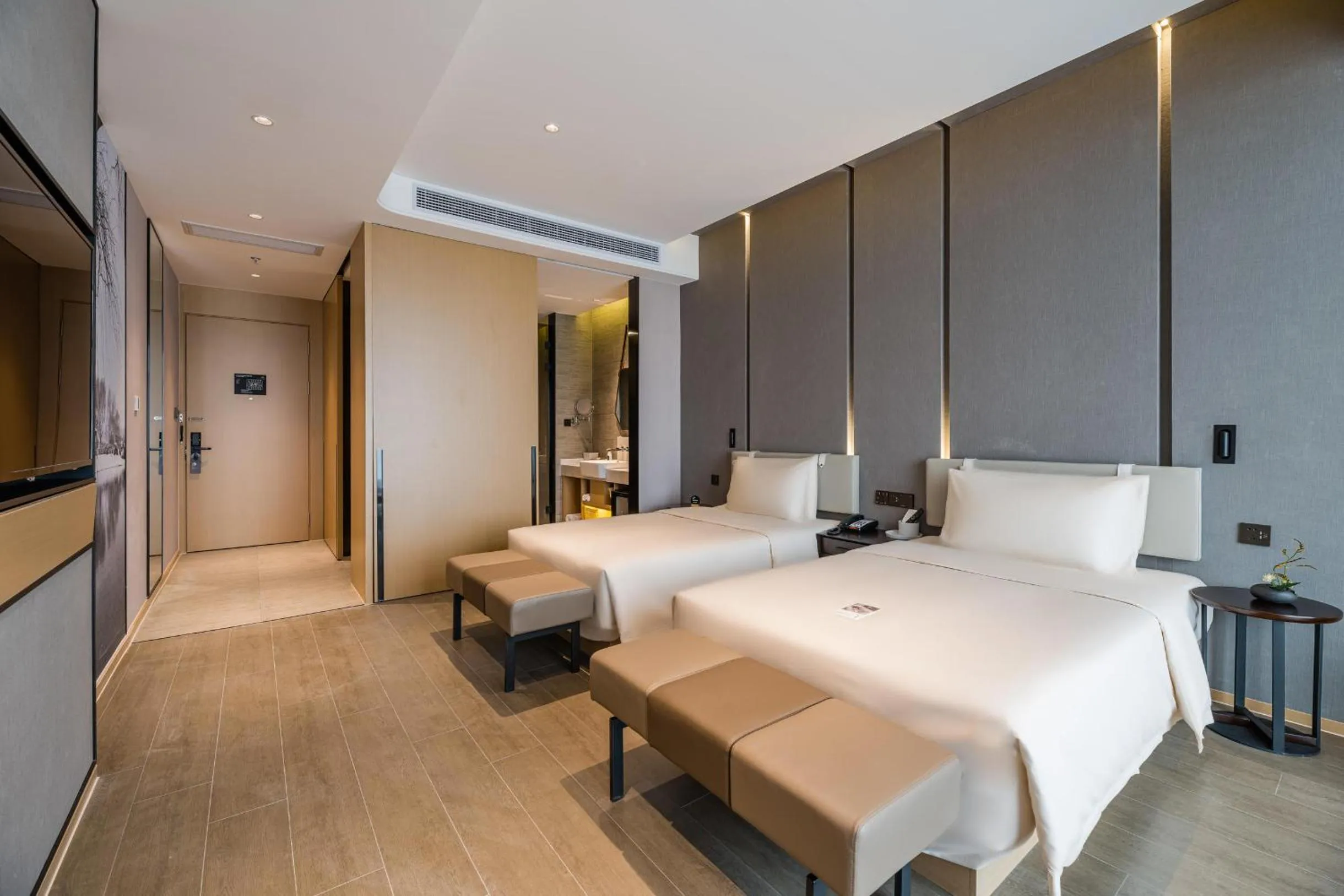 Bed in Atour Hotel Wuxi Coast City