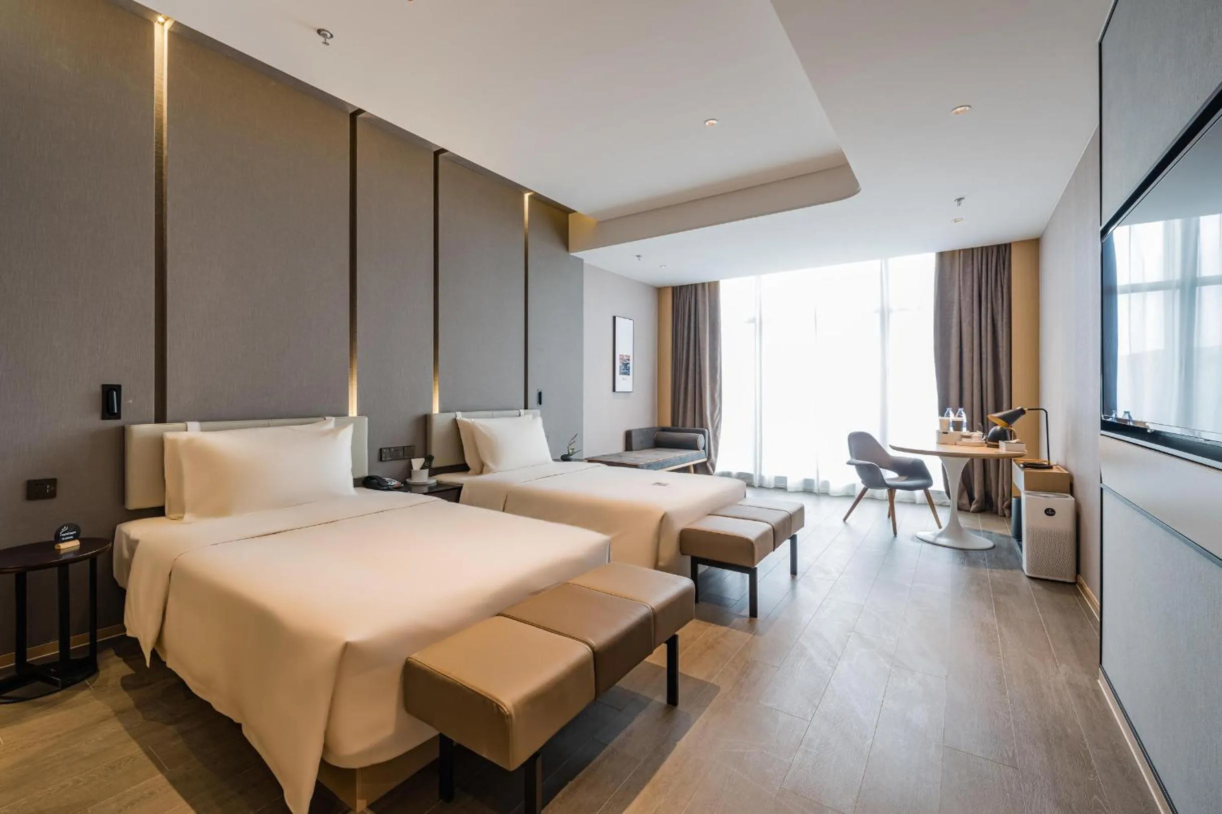 Bed in Atour Hotel Wuxi Coast City
