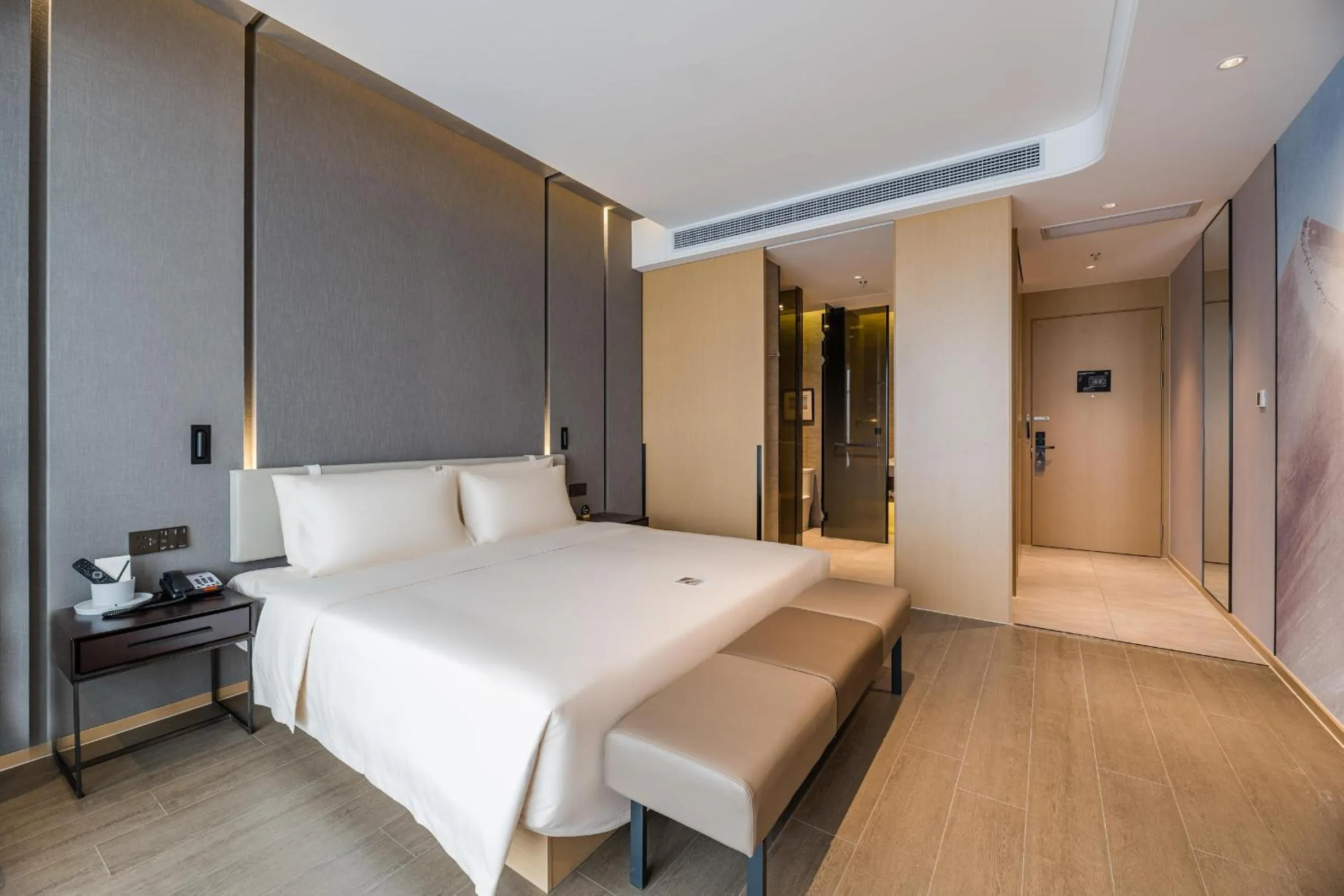 Bed in Atour Hotel Wuxi Coast City