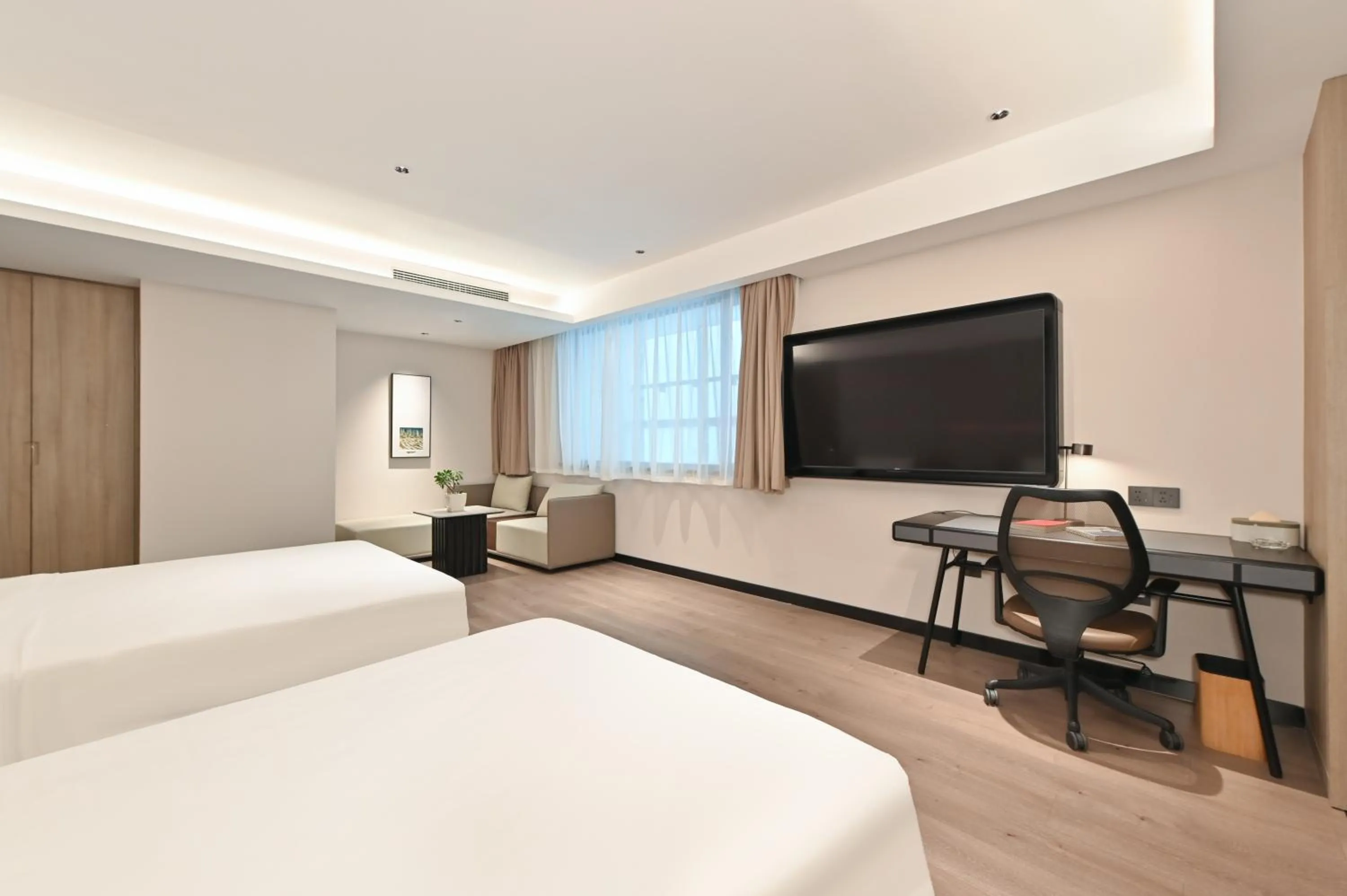 Bed in Atour Hotel Dalian Zhongshan Square