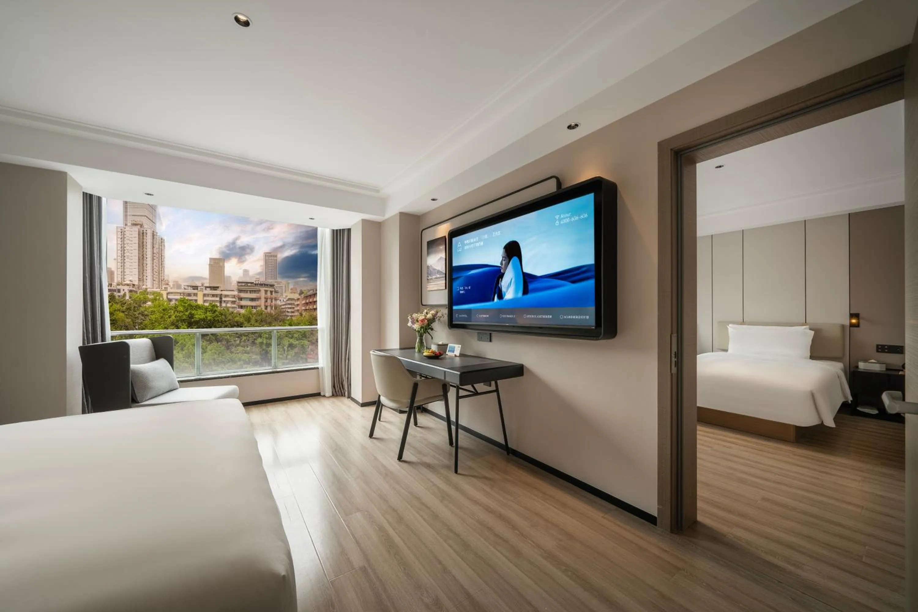 Communal lounge/ TV room, Bed in Atour Hotel Chengdu Taikoo Li Riverside
