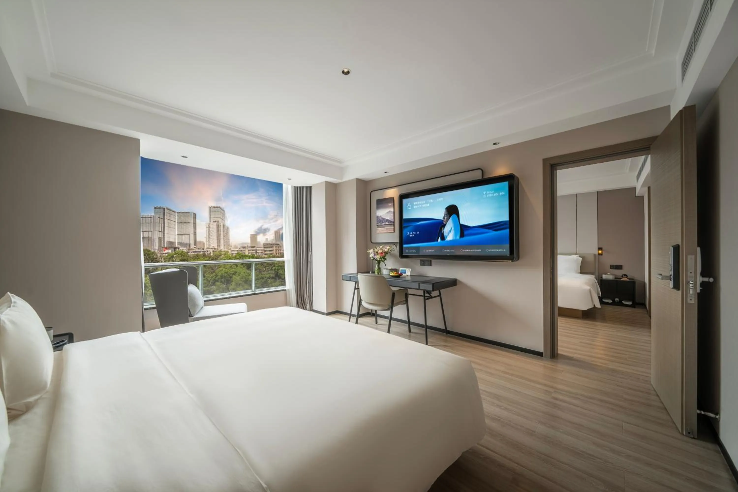 Communal lounge/ TV room, Bed in Atour Hotel Chengdu Taikoo Li Riverside