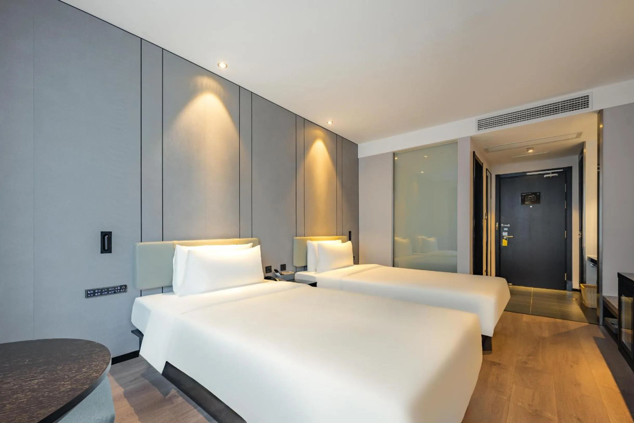 Bed in Atour X Hotel Hangzhou Binjiang Jiangnan Avenue