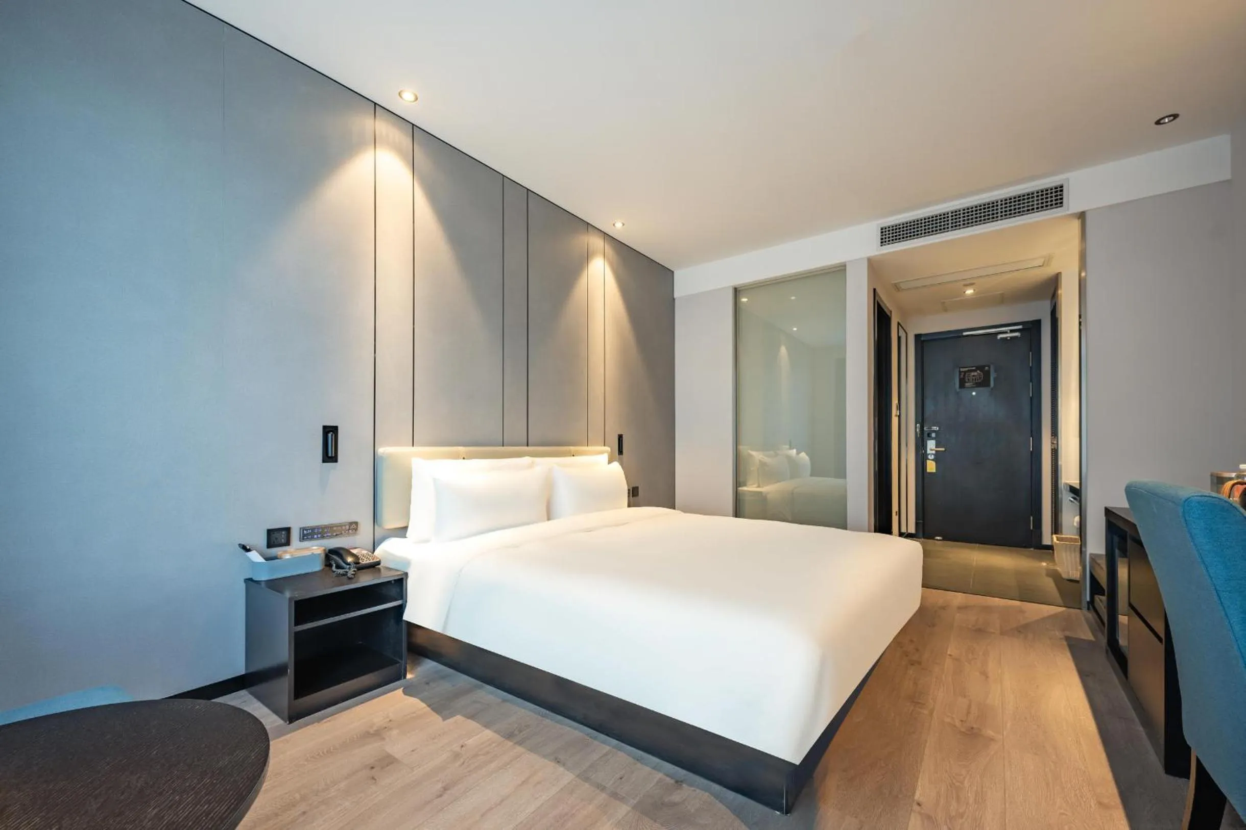 Bed in Atour X Hotel Hangzhou Binjiang Jiangnan Avenue