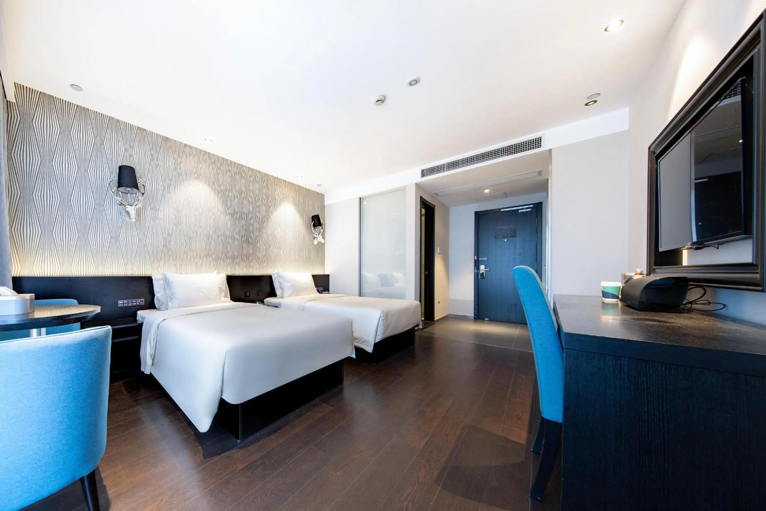 Bed in Atour X Hotel Hangzhou Binjiang Jiangnan Avenue