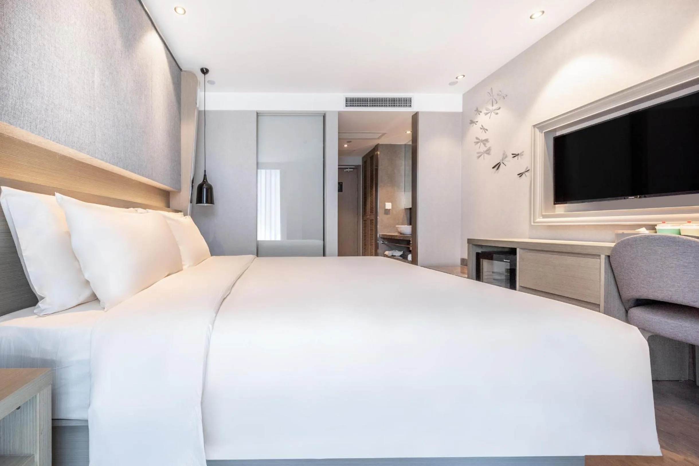 Bed in Atour X Hotel Hangzhou Binjiang Jiangnan Avenue