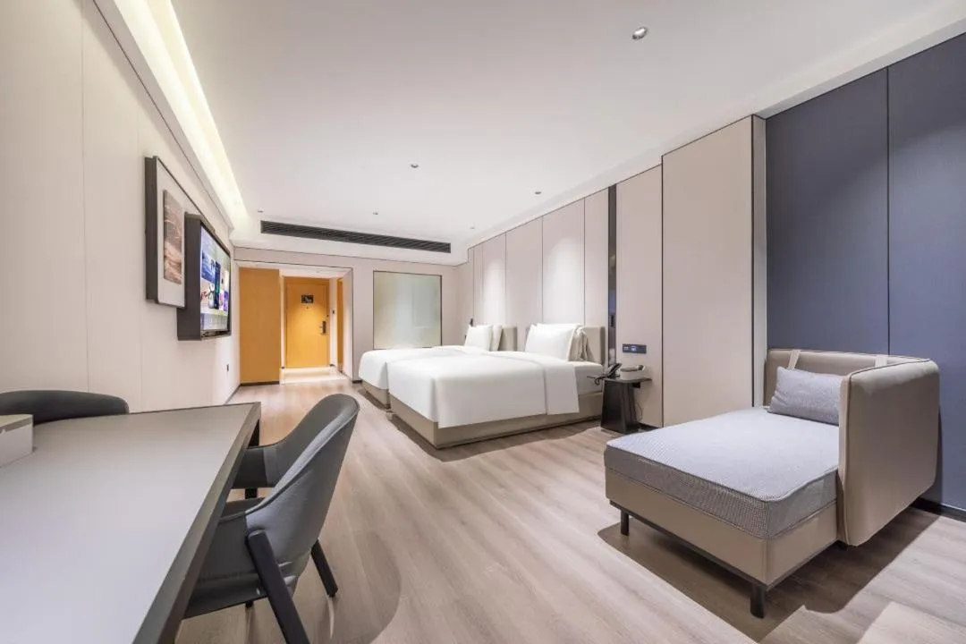 Bed in Atour X Hotel Guangzhou Baiyun International Airport Renhe Station