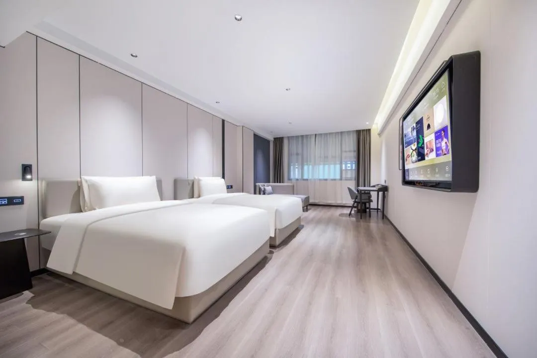 Bed in Atour X Hotel Guangzhou Baiyun International Airport Renhe Station
