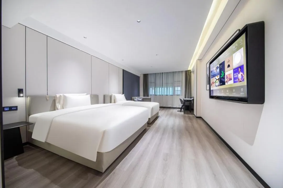 Bed in Atour X Hotel Guangzhou Baiyun International Airport Renhe Station