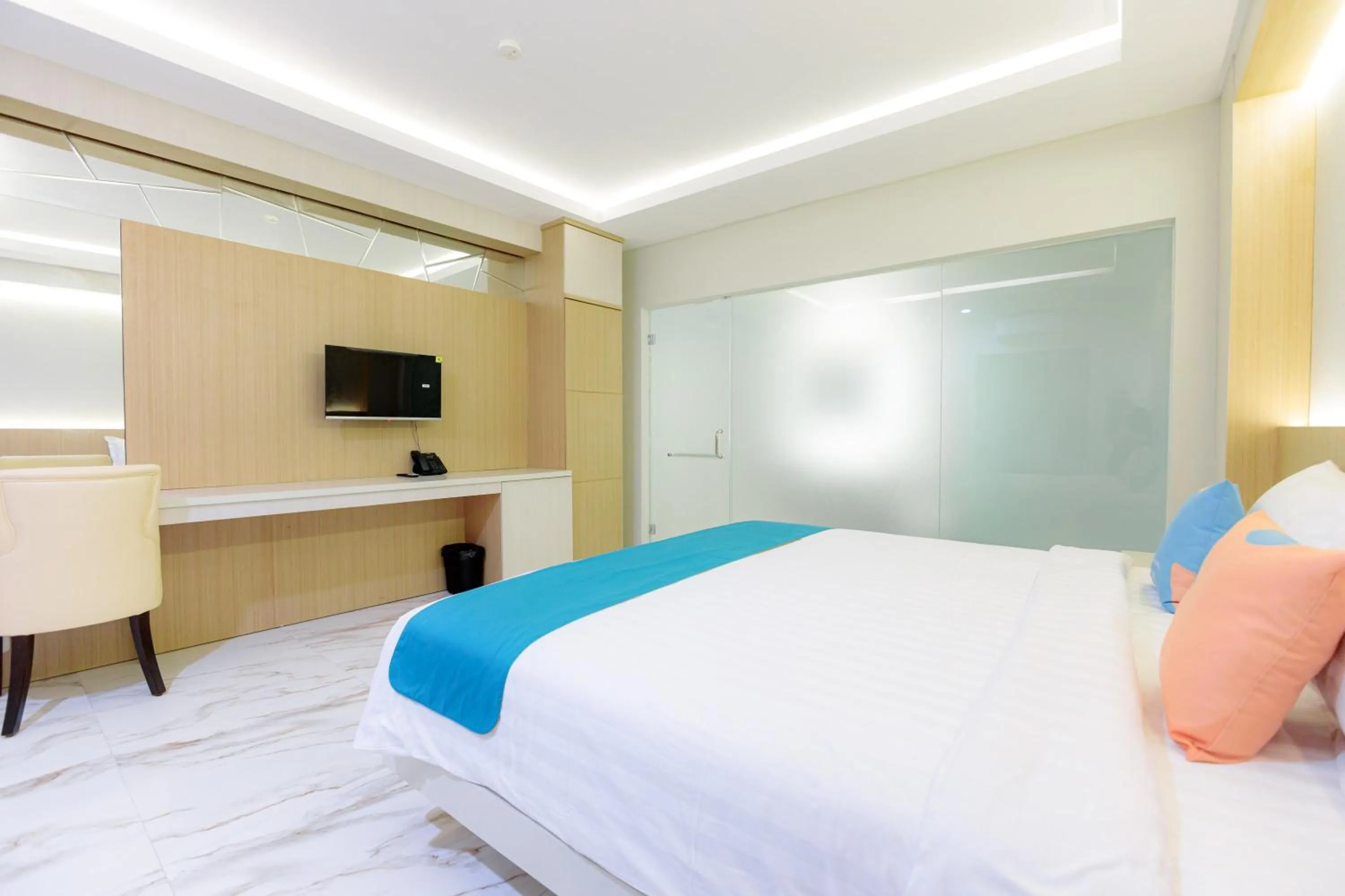 Bed in Sans Hotel 88 Andalan Surabaya by RedDoorz