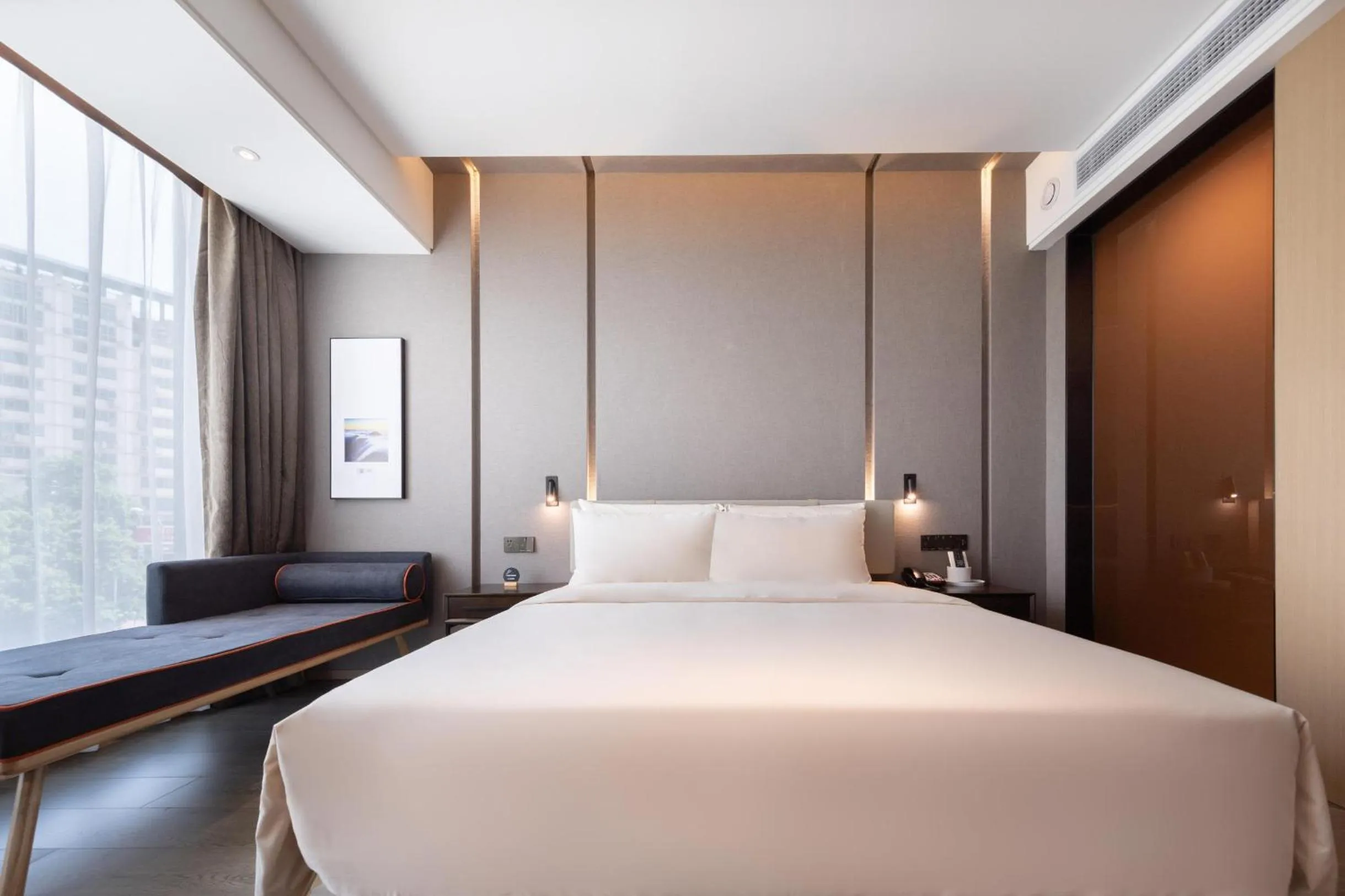 Bed in Atour Hotel Chongqing Guanyinqiao Flower Garden