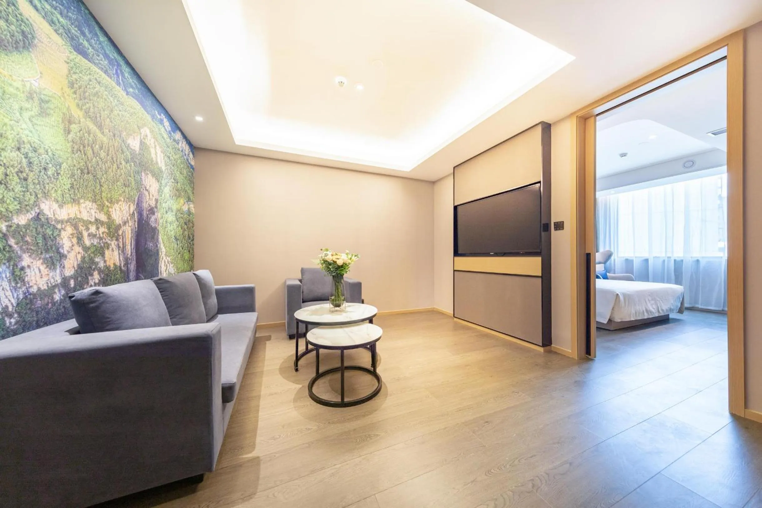 Living room, Bed in Atour Hotel Chongqing Guanyinqiao Flower Garden