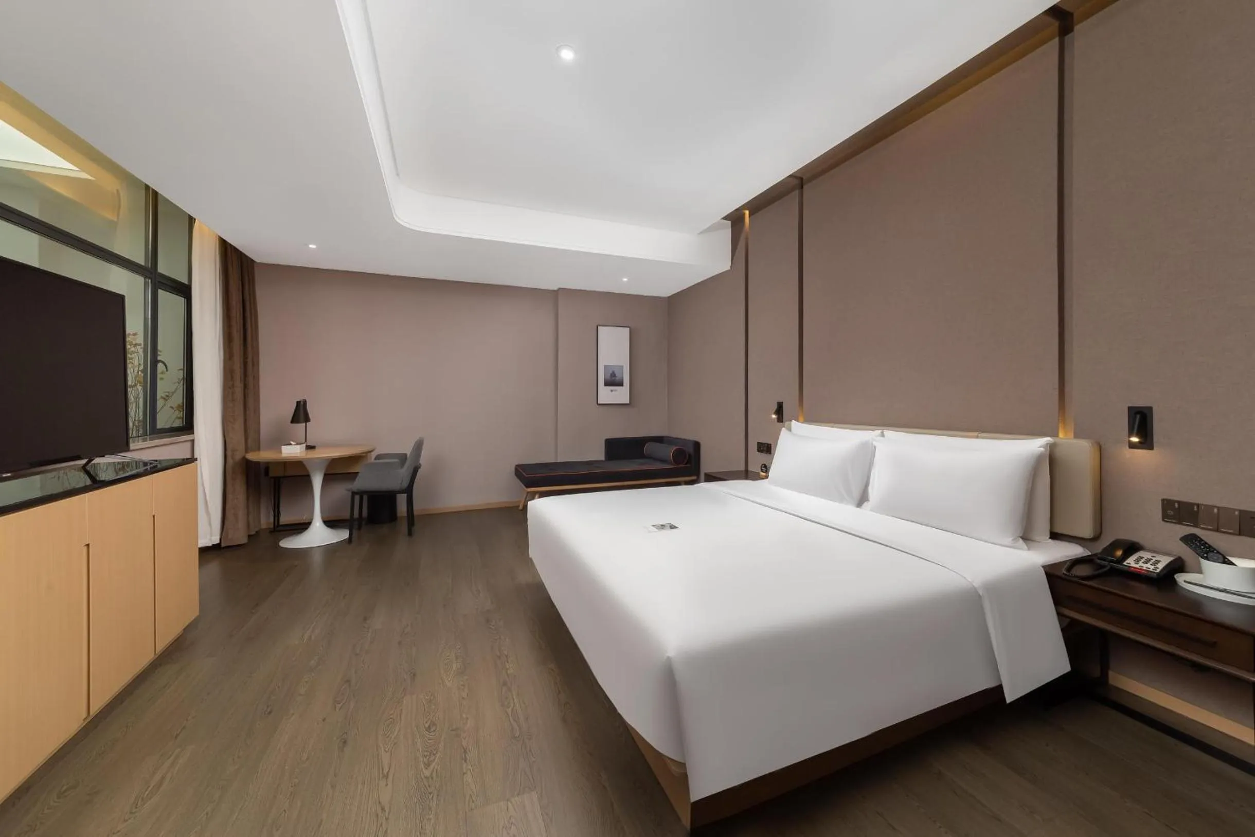 Bed in Atour Hotel Chongqing Guanyinqiao Flower Garden