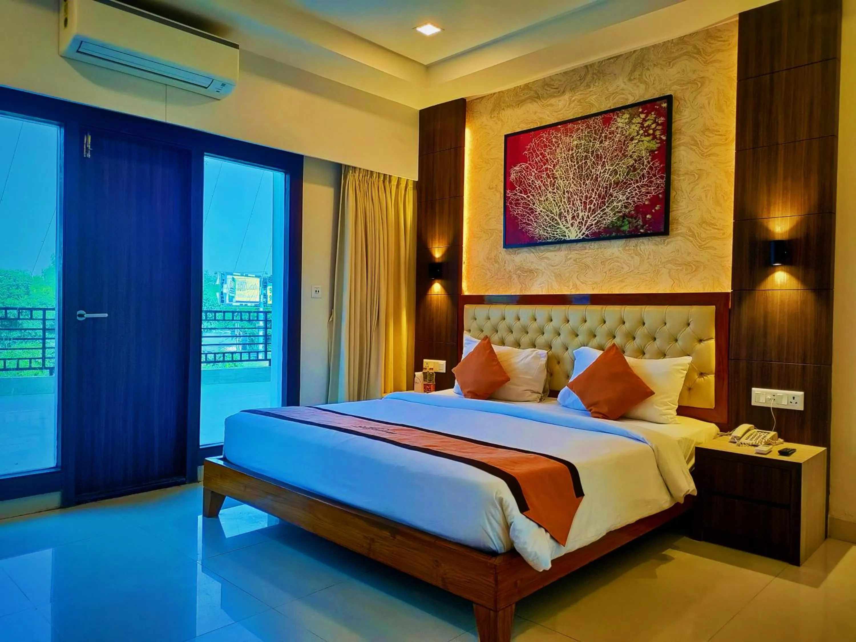 Bed in Sambhabana Hotel & Suites
