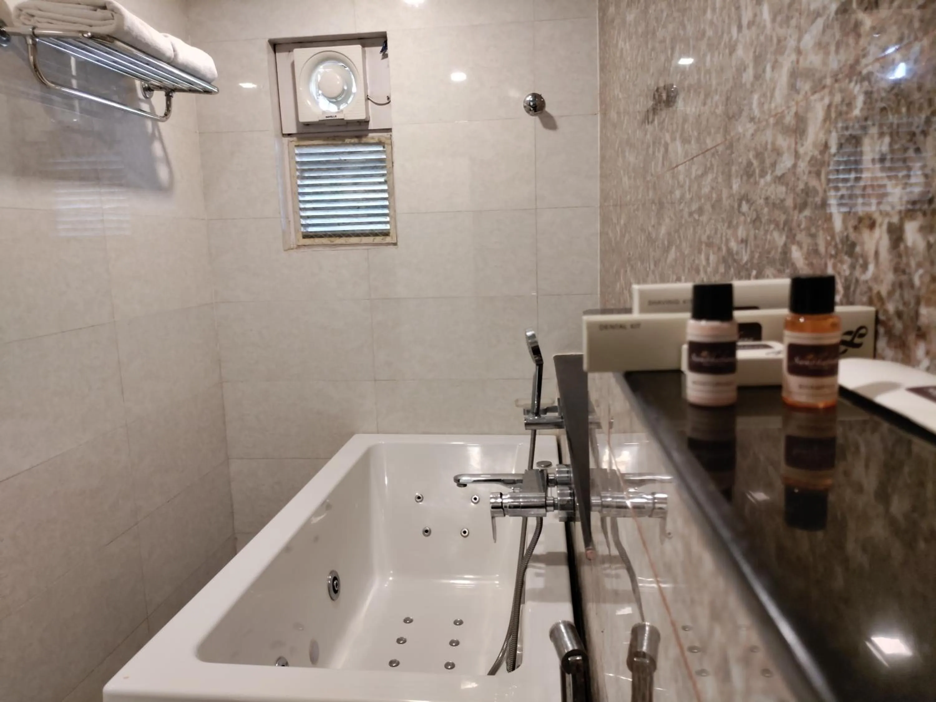 Bath in Sambhabana Hotel & Suites