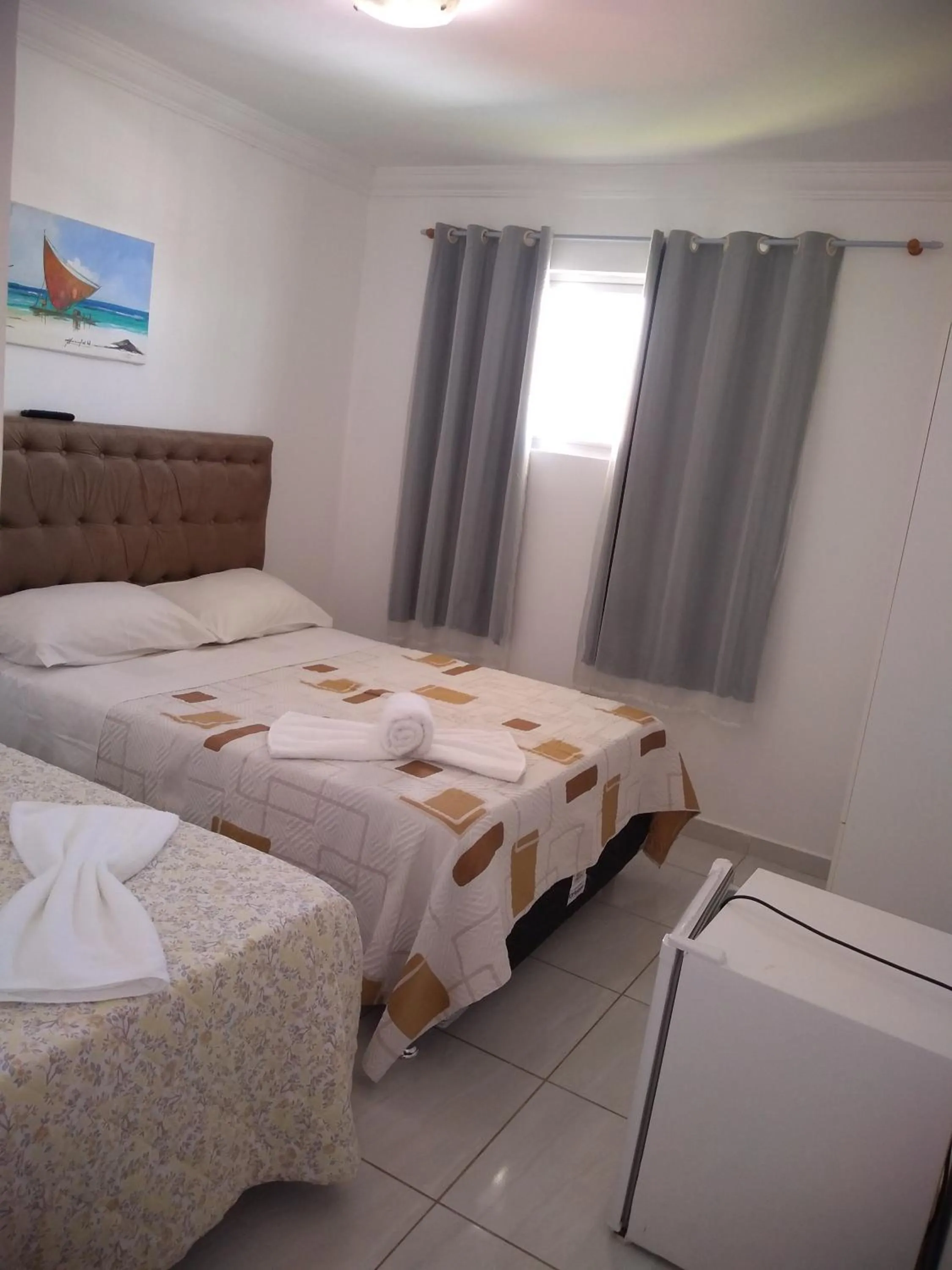 Photo of the whole room, Bed in Suítes São Francisco