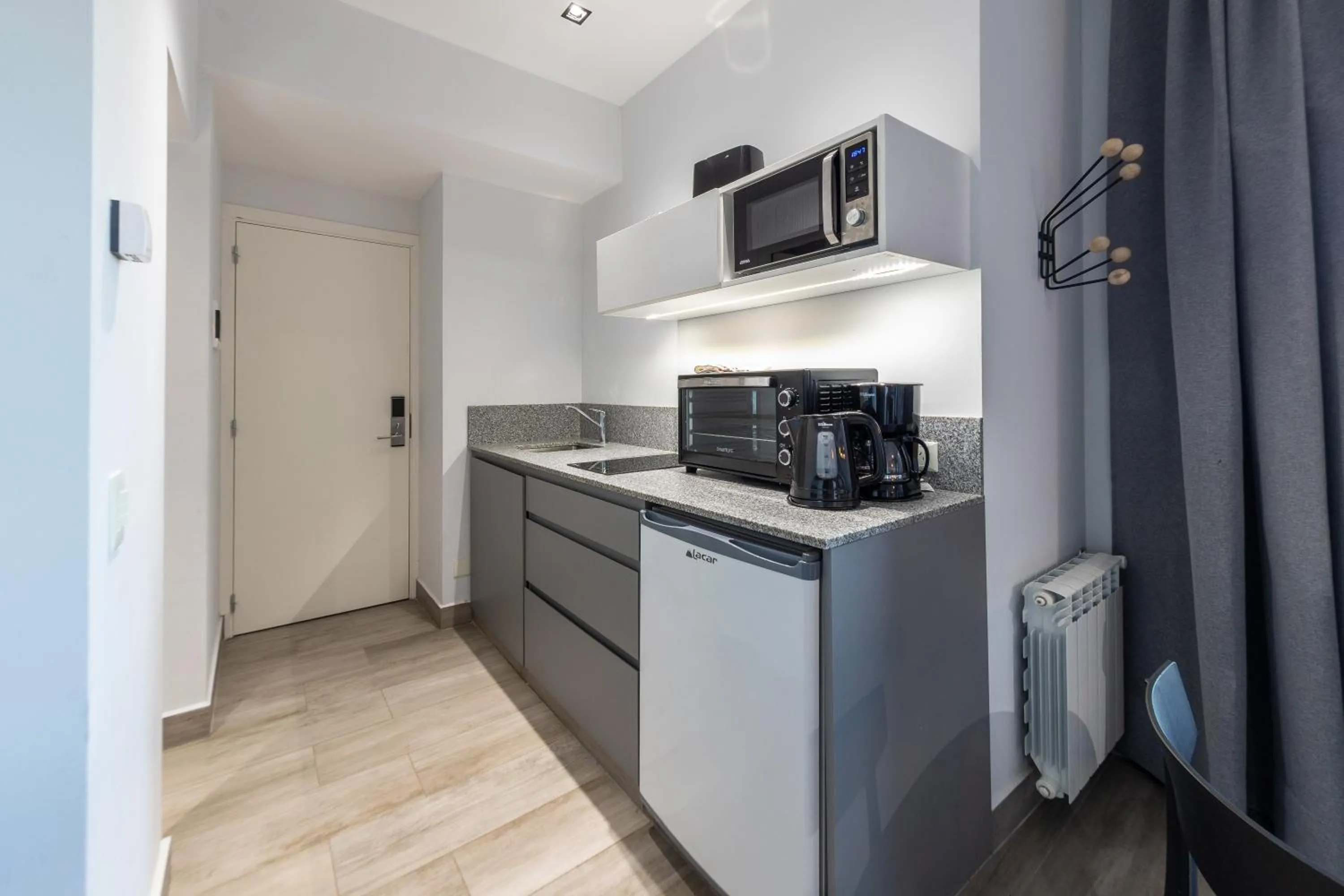 Kitchen or kitchenette in Departamentos Casa Piamonte