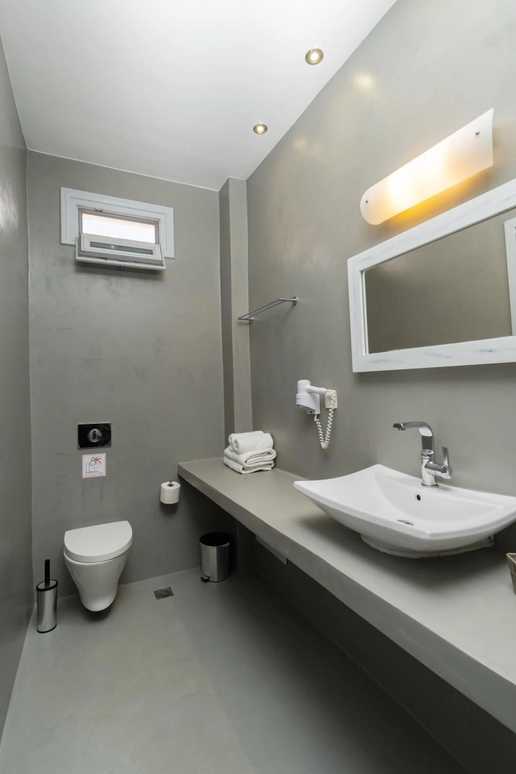 Bathroom in Central Fira Suites