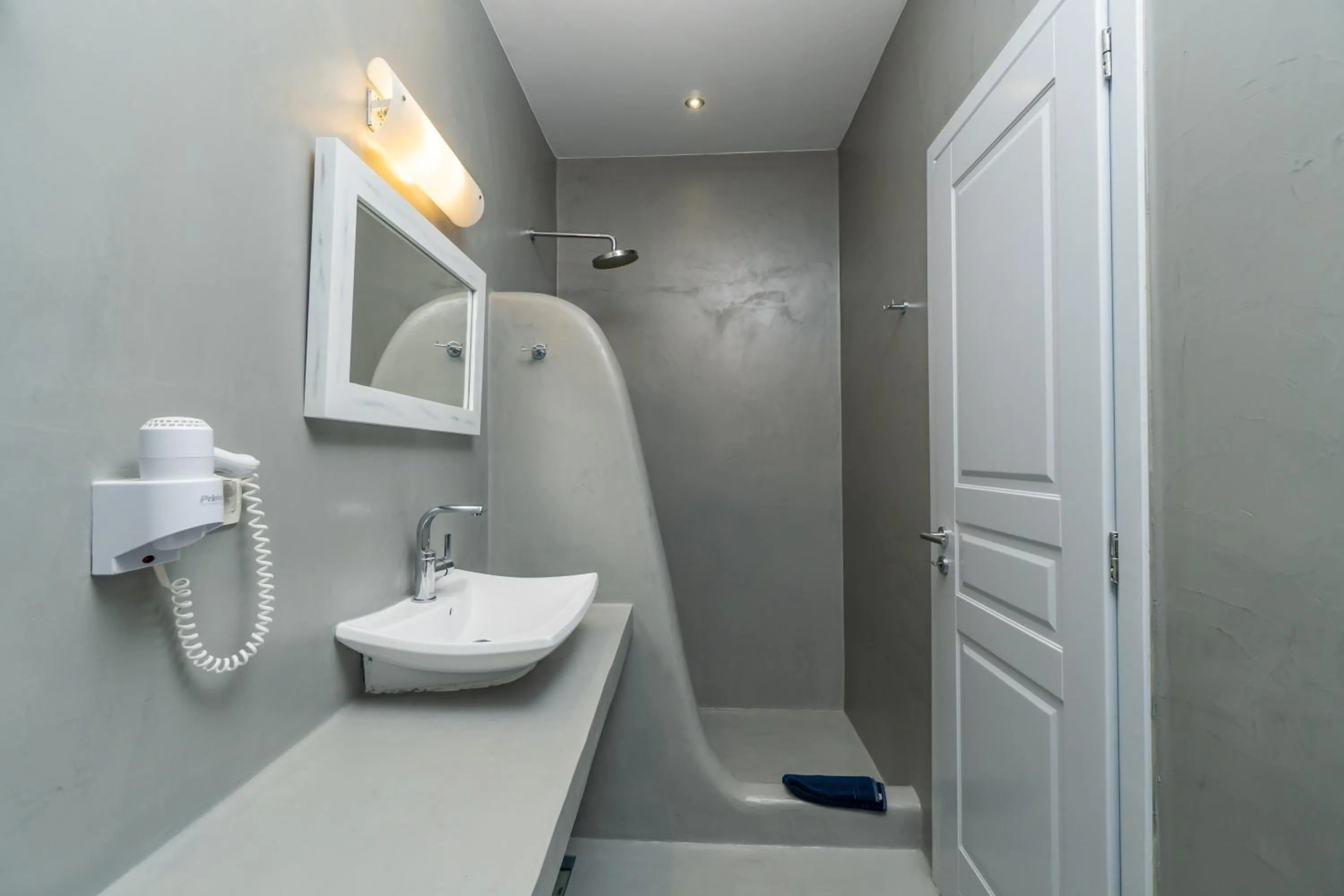 Bathroom in Central Fira Suites