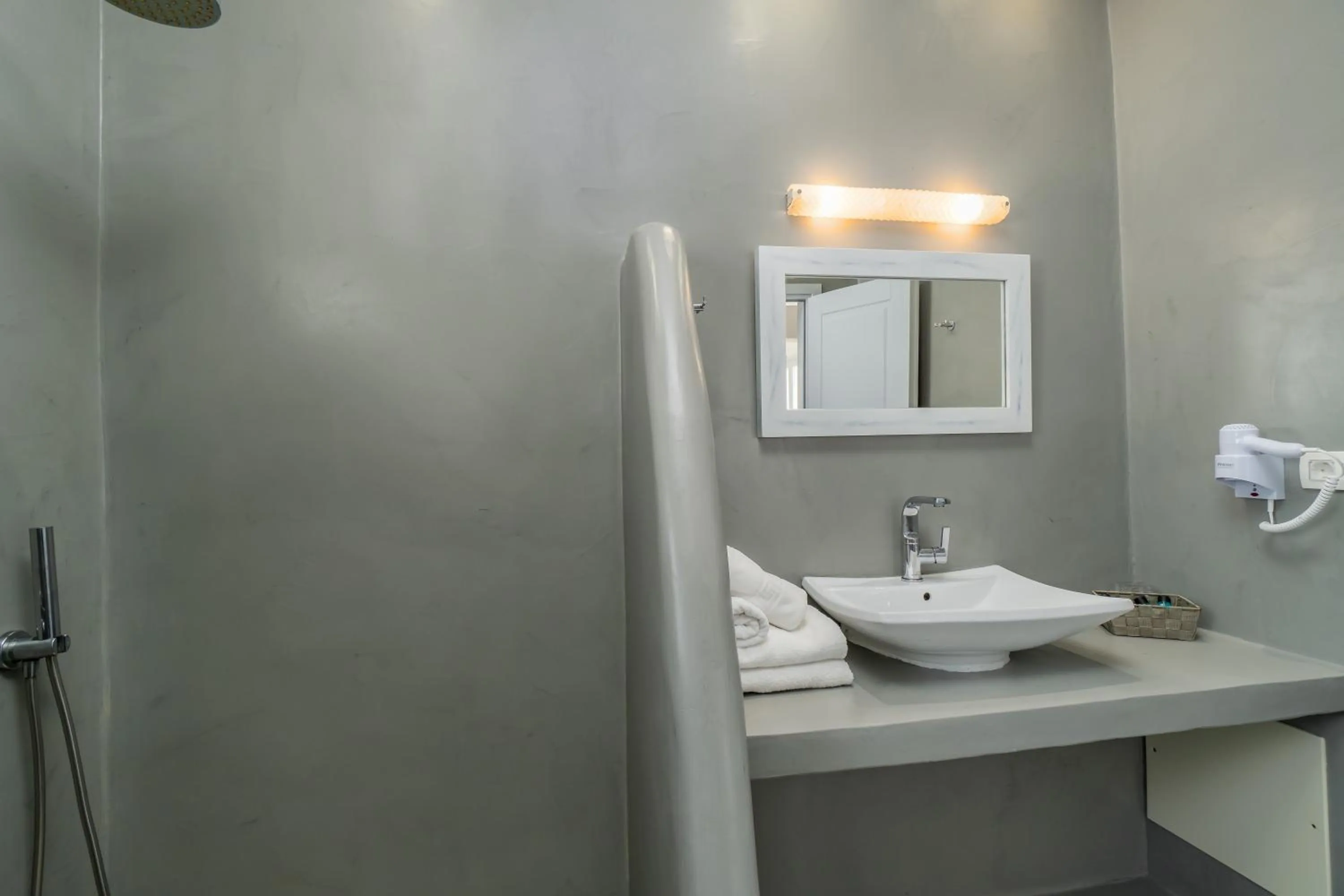 Bathroom in Central Fira Suites