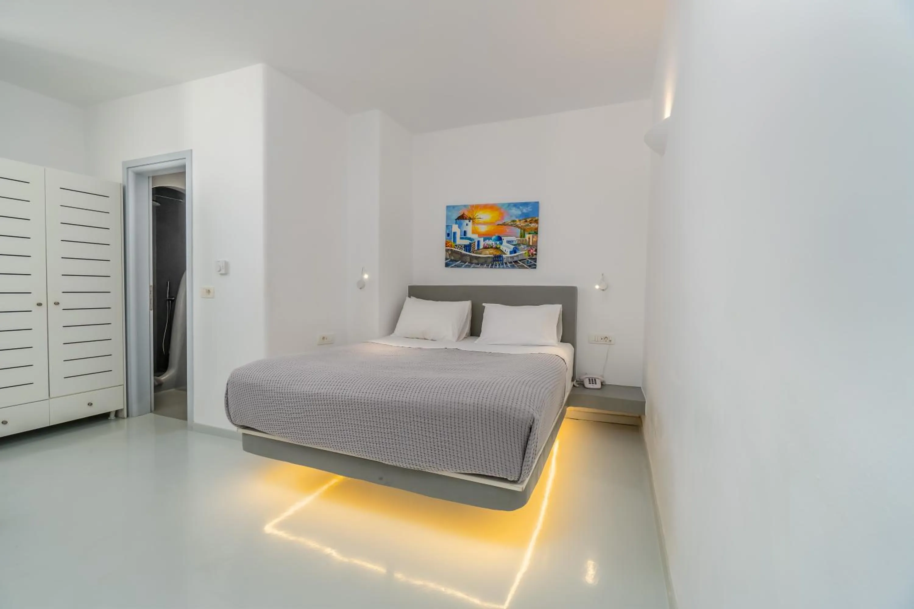 Photo of the whole room, Bed in Central Fira Suites