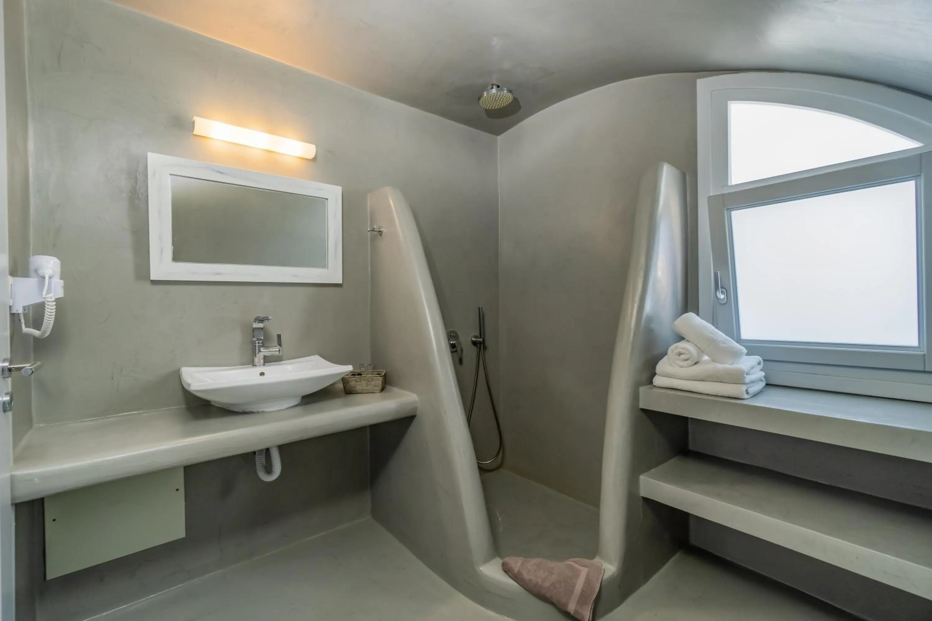 Bathroom, Bed in Central Fira Suites