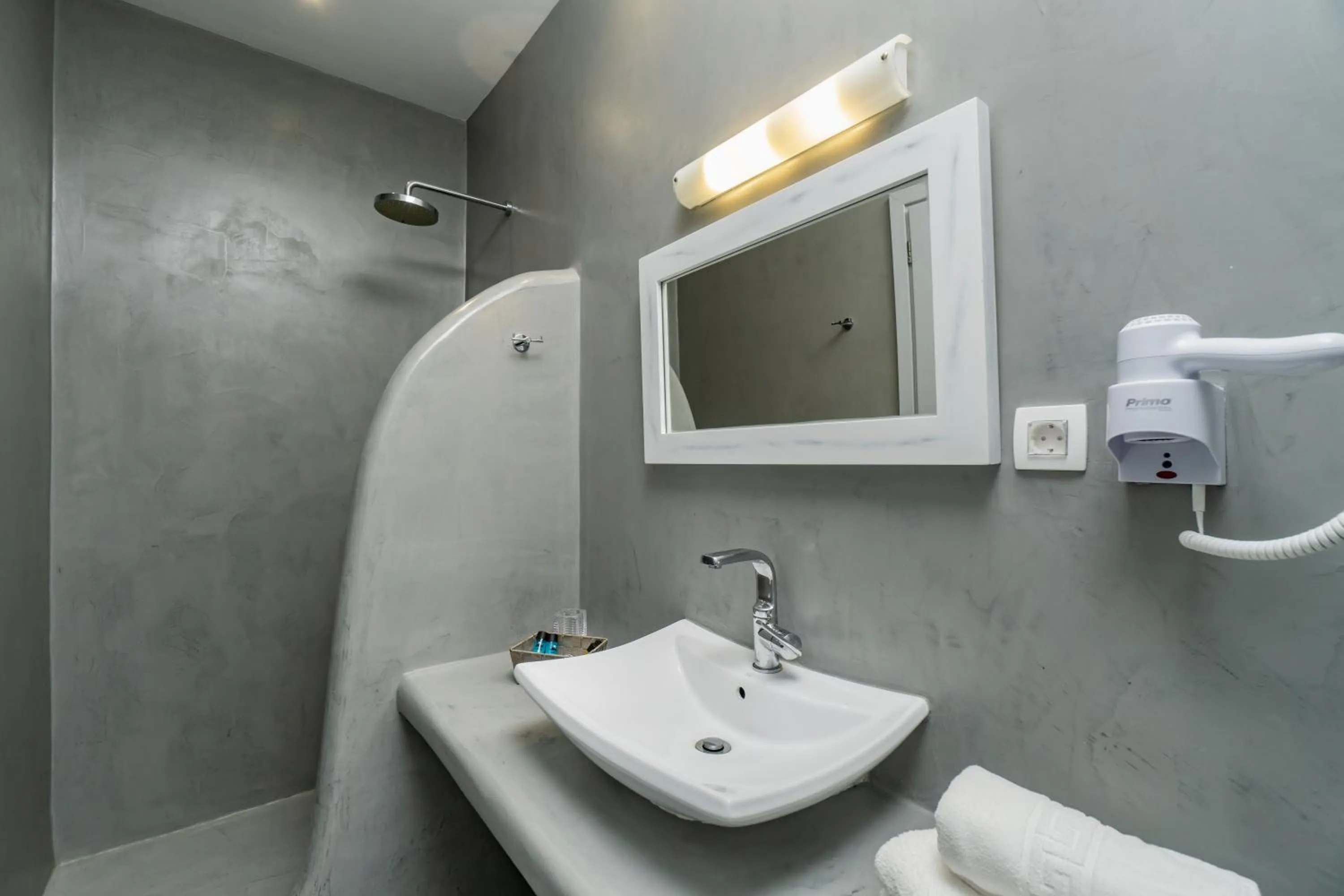 Bathroom in Central Fira Suites