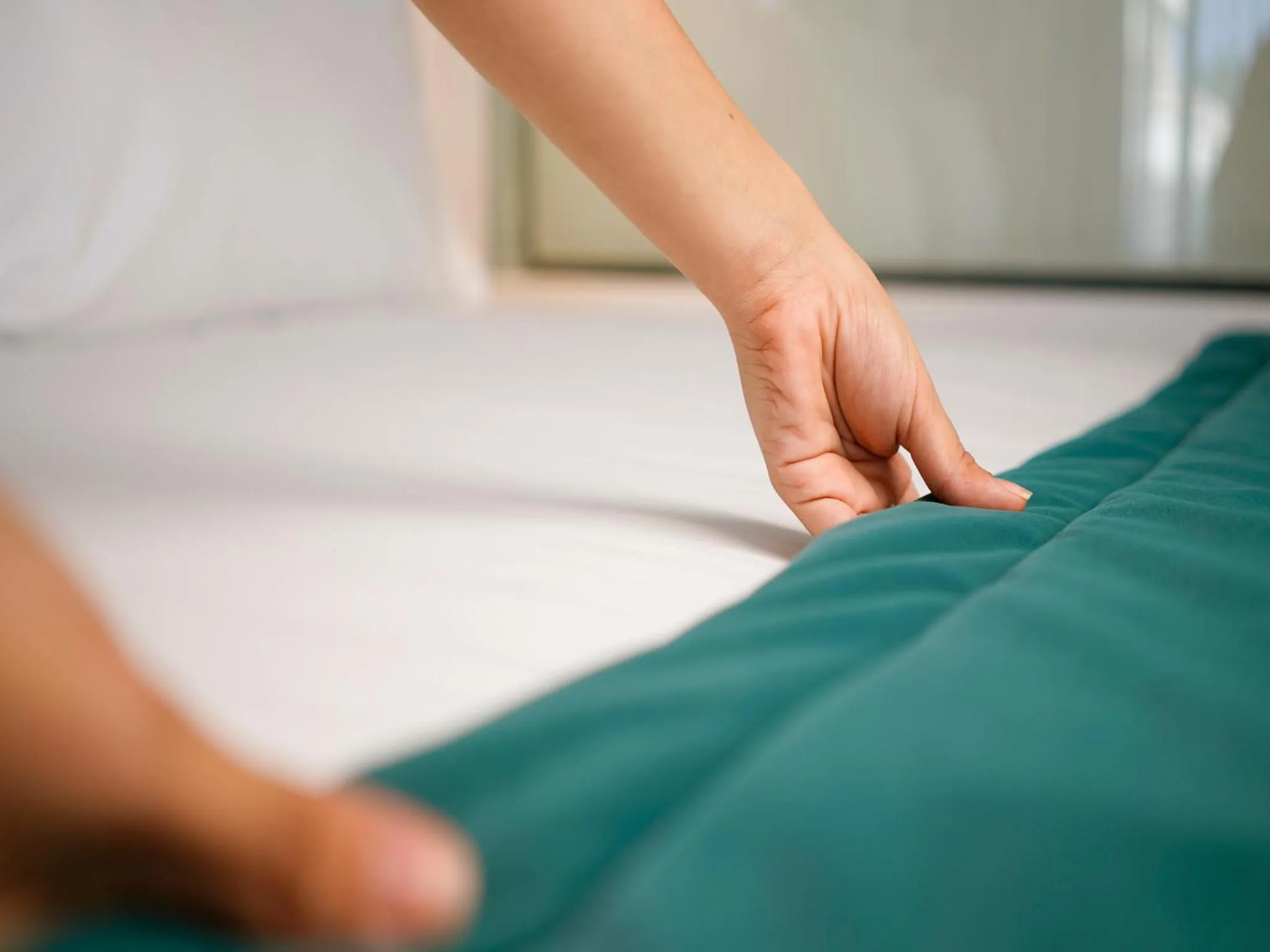 Bed in Petit Palace Suites Hotel