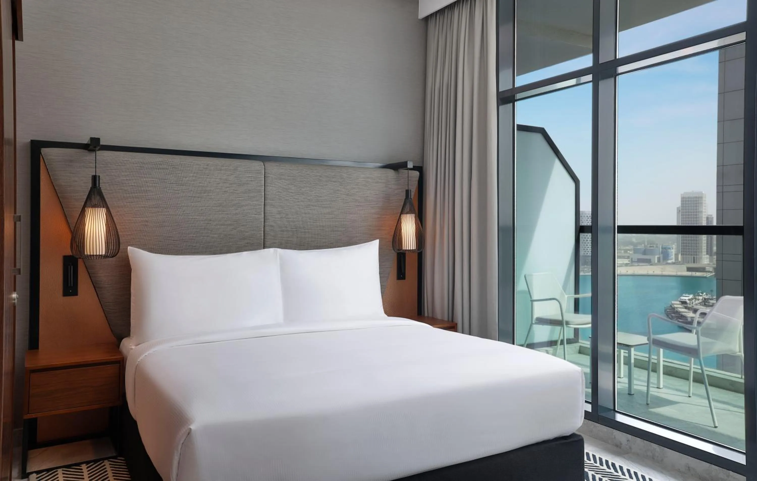 Bed in The First Collection Waterfront, Dubai, a Tribute Portfolio Hotel